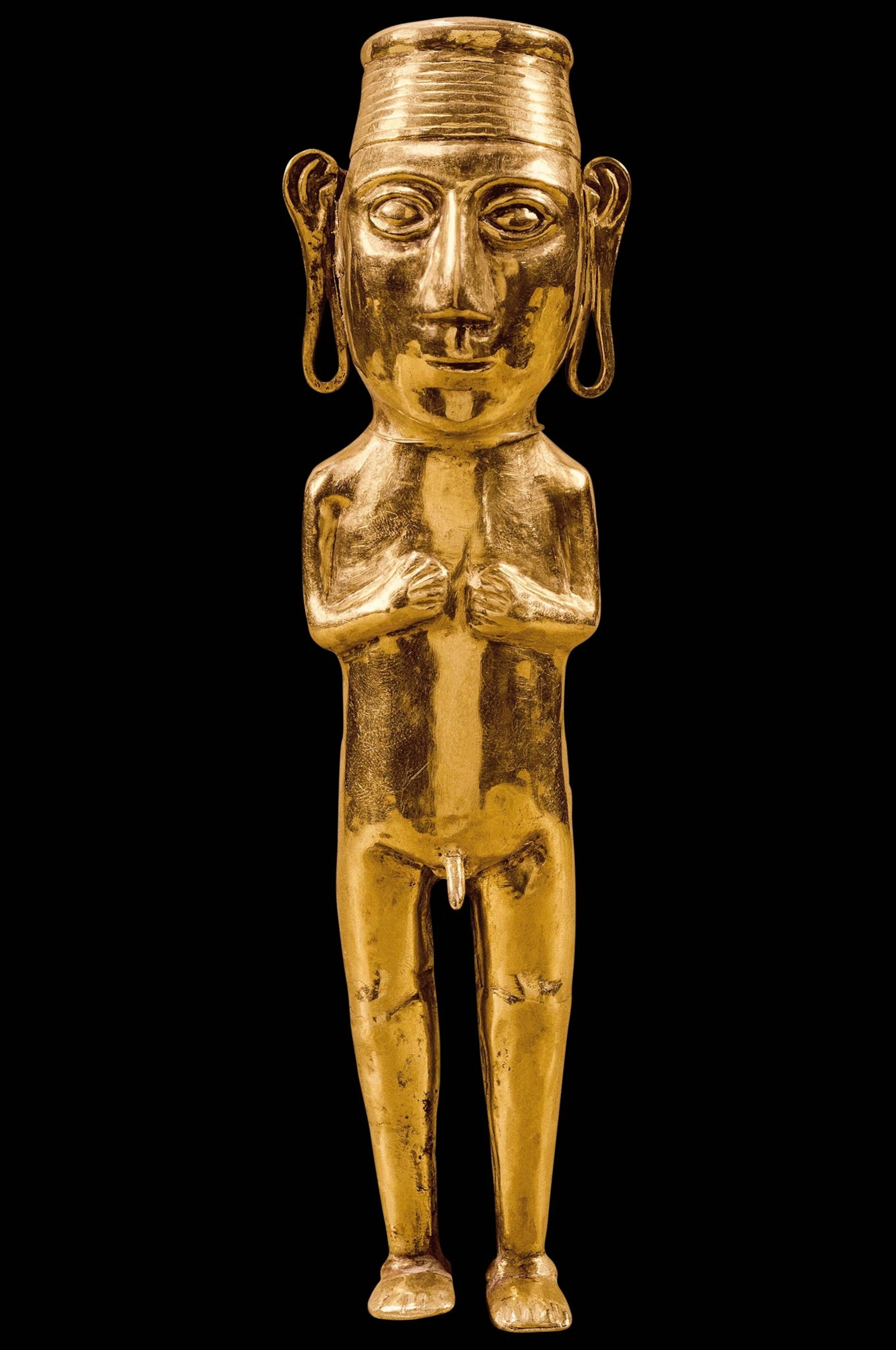 A man with elongated ears mimics Inca nobles whose earrings stretched their lobes in this 15th-16th centuries figurine.