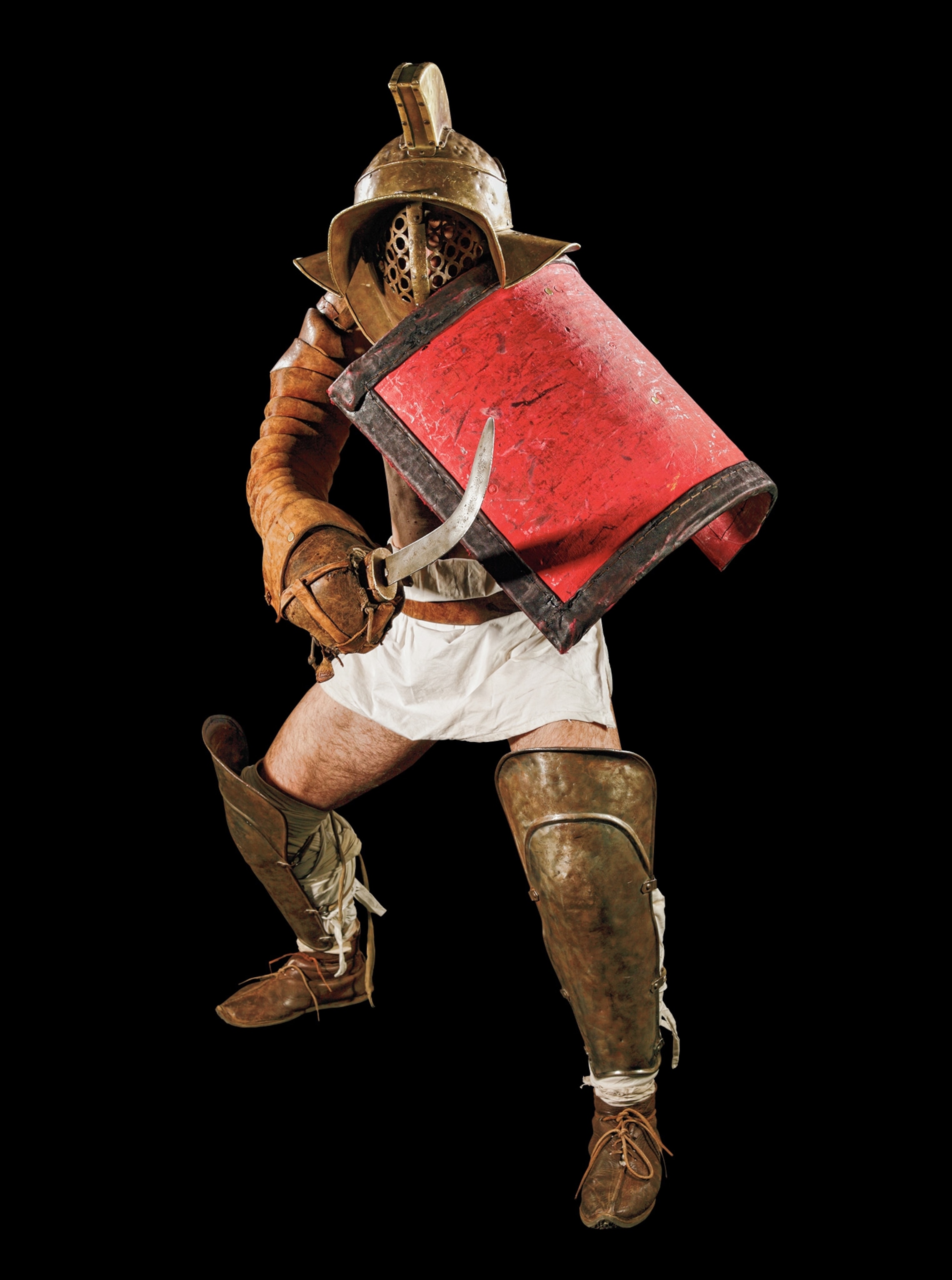 The thraex was easily recognized by his J-shaped sword and small, curved shield. His armor was limited to leg and arm protectors, forcing him to rely on speed and agility to triumph in combat.