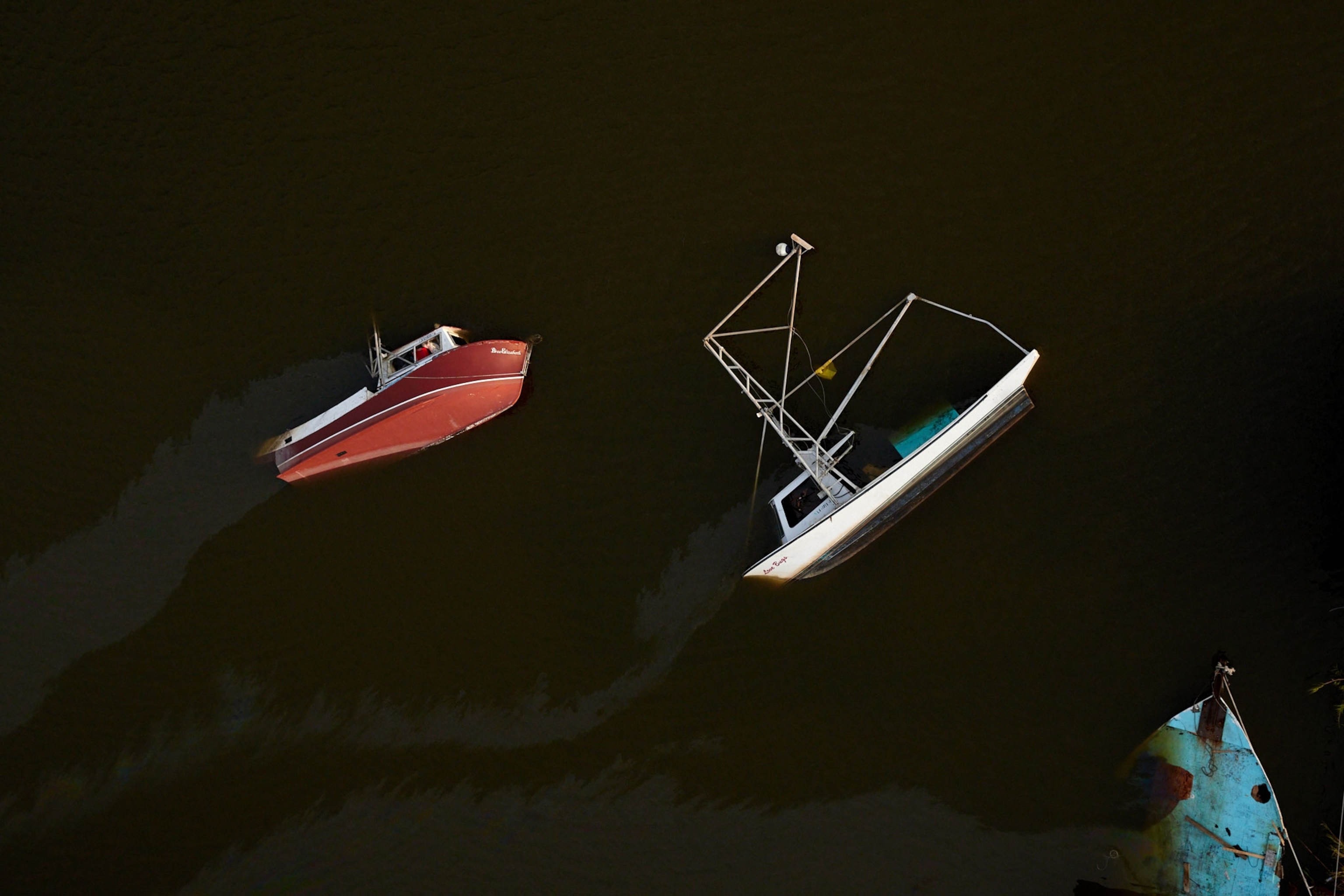 Sunken fishing boats after Hurricane Ida hit Louisiana's coast