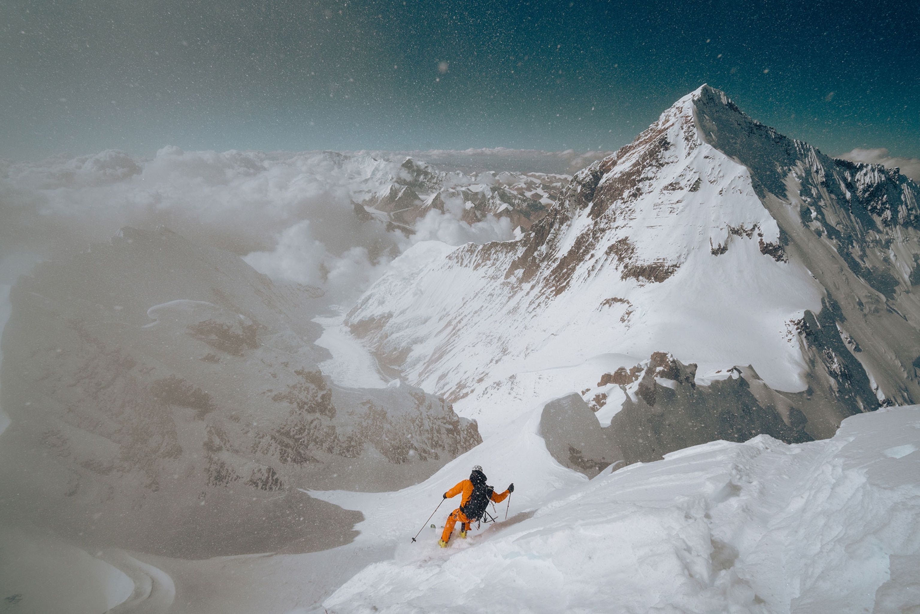 Hilaree Nelson and Jim Morrison climbing skiing down Lhotse in Nepal