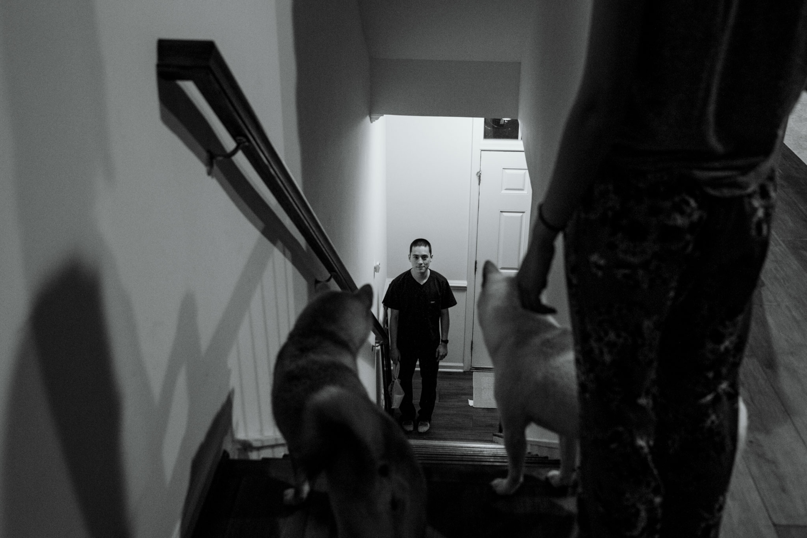 a man standing inside his home