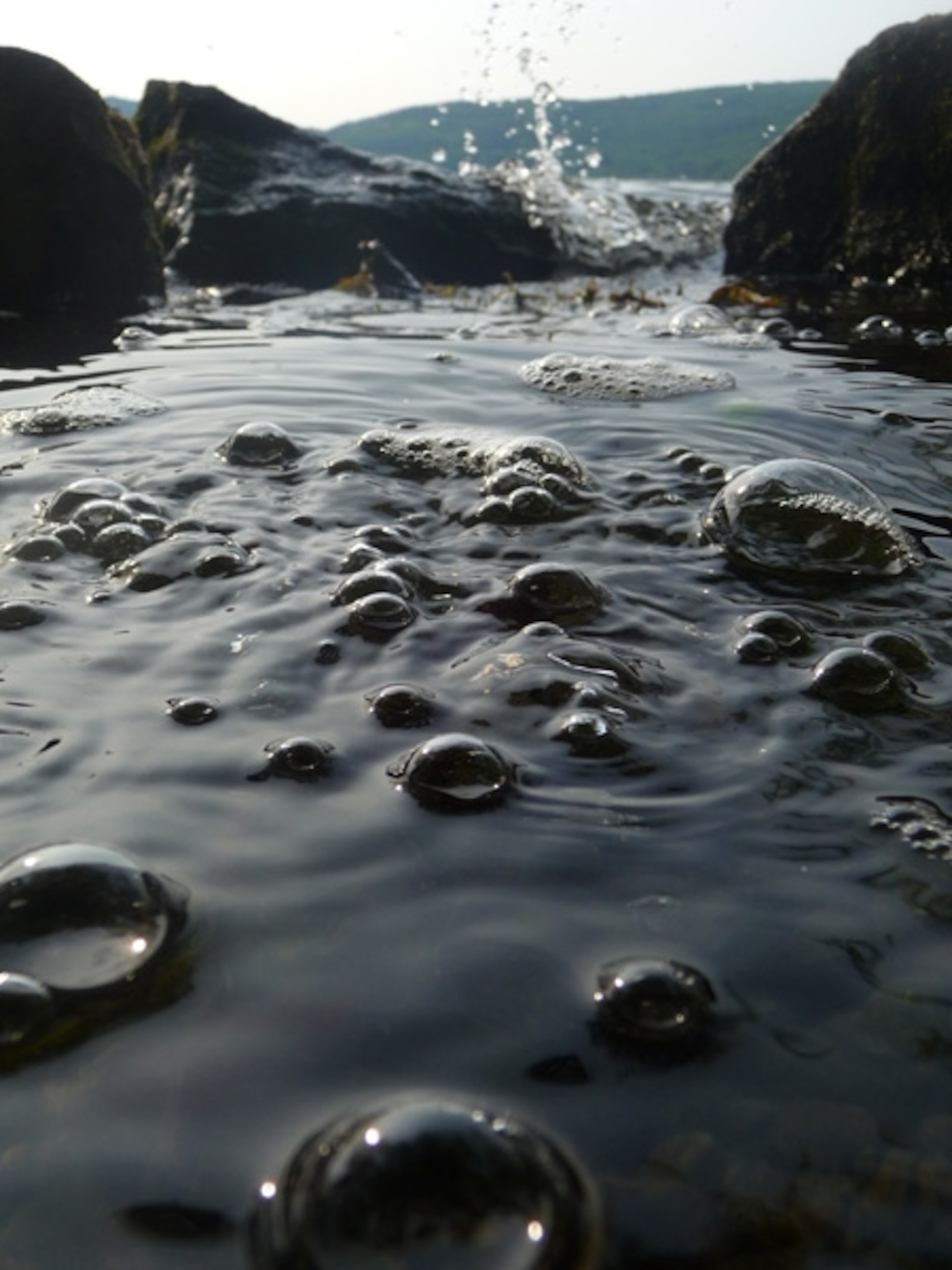Water bubbling in a volcanic lake