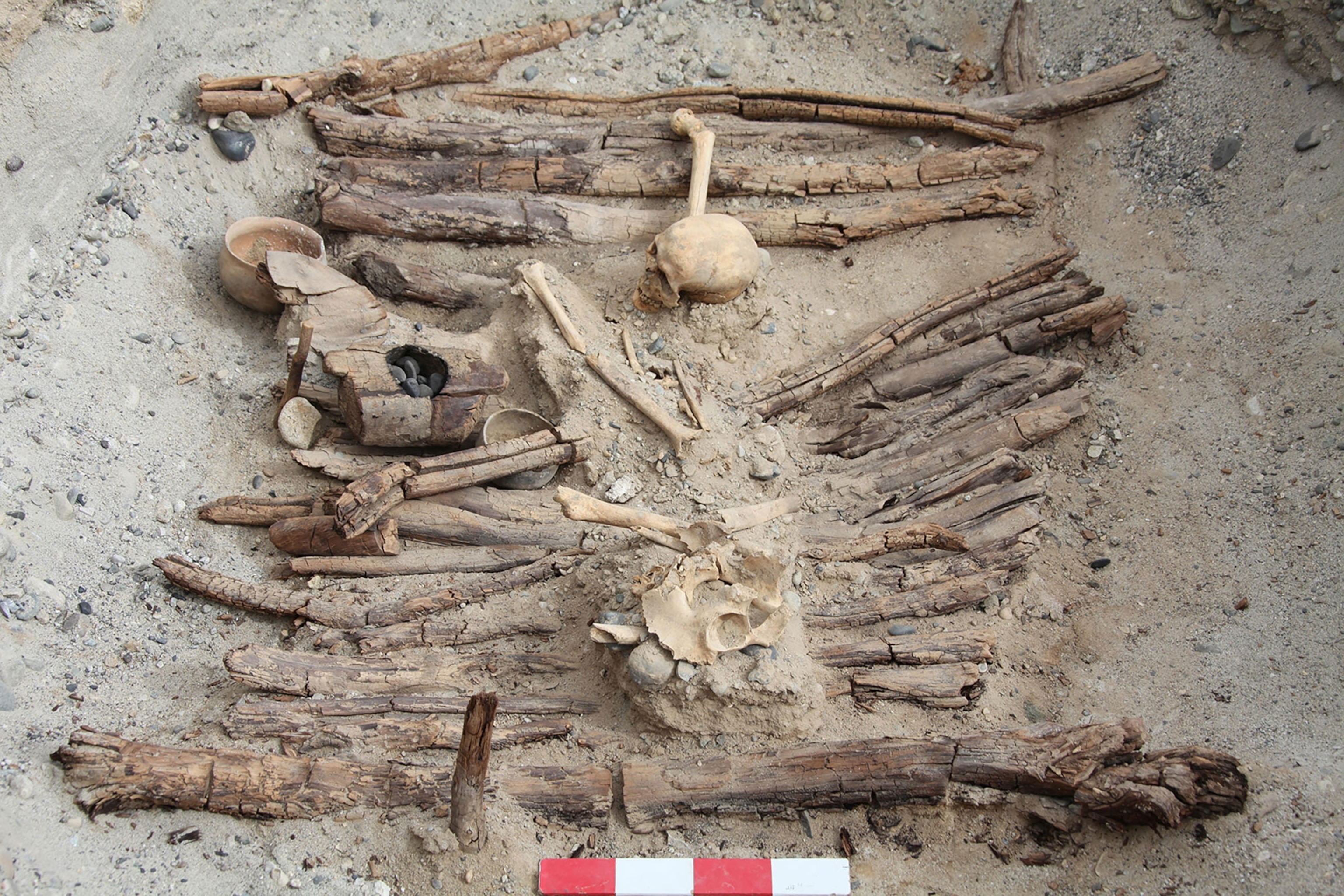 braziers and the skeleton found in the tomb