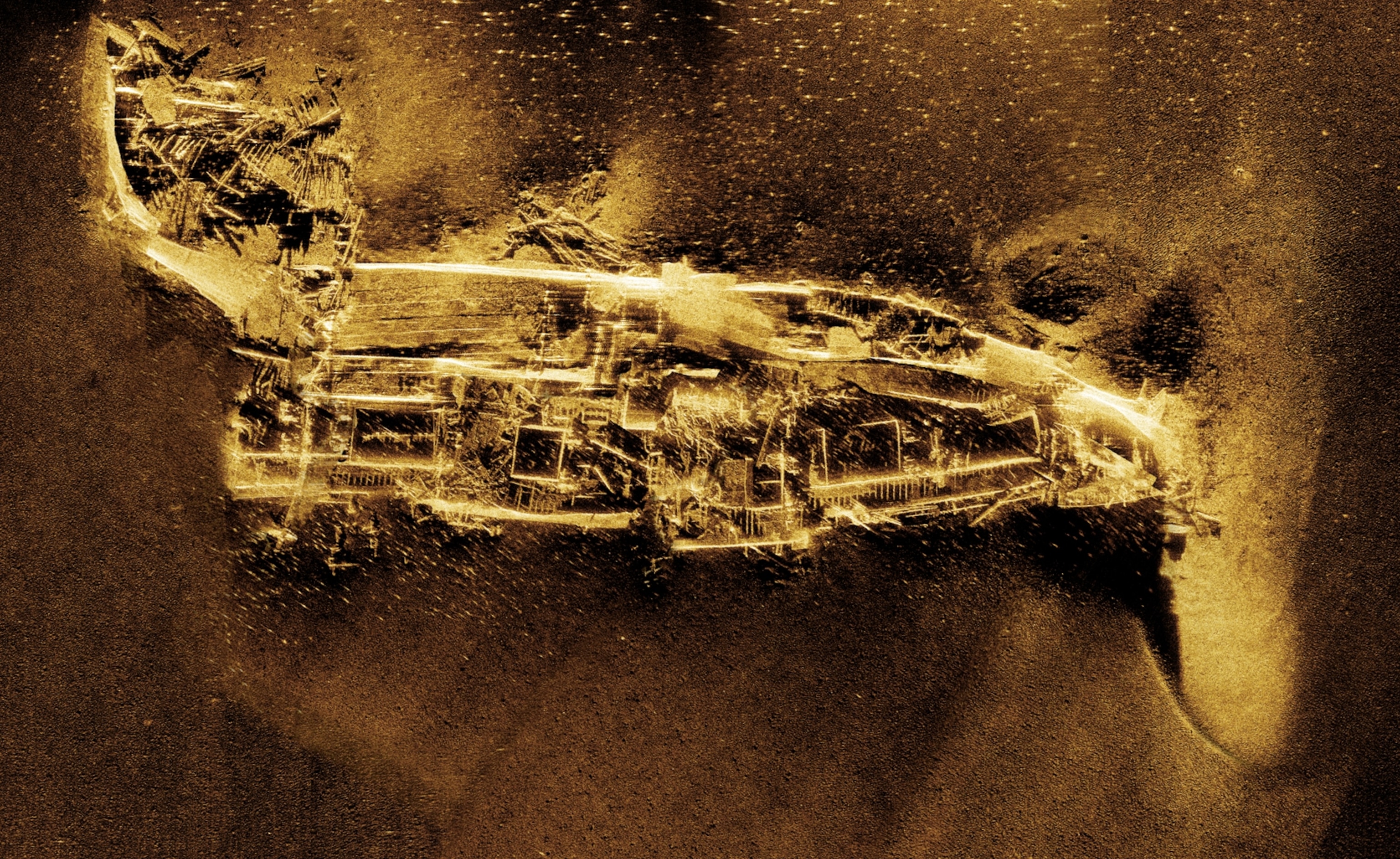 A detailed sonar scan revealing a scattering of wreckage from a ship.