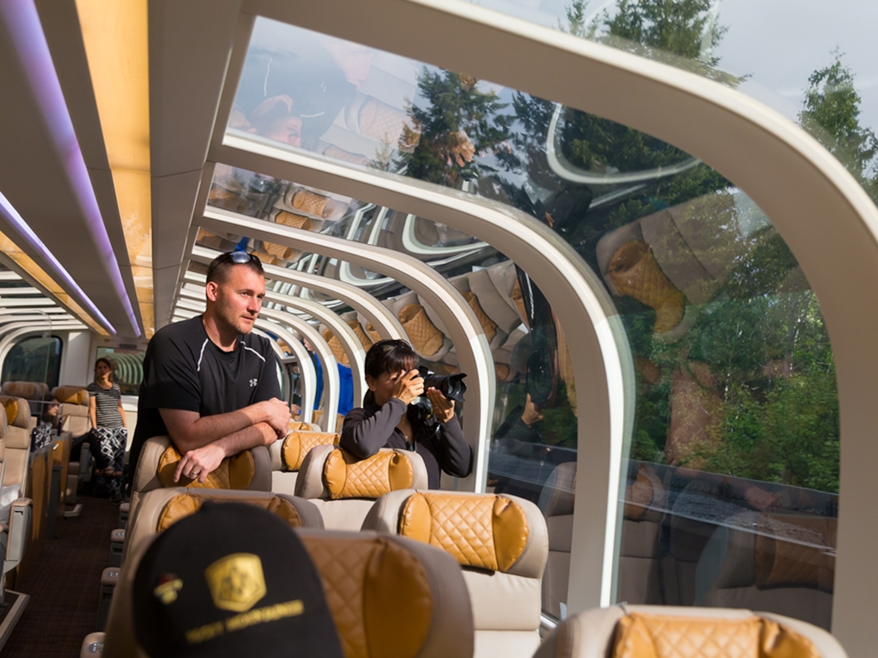 people inside the Rocky Mountaineer train, Canada