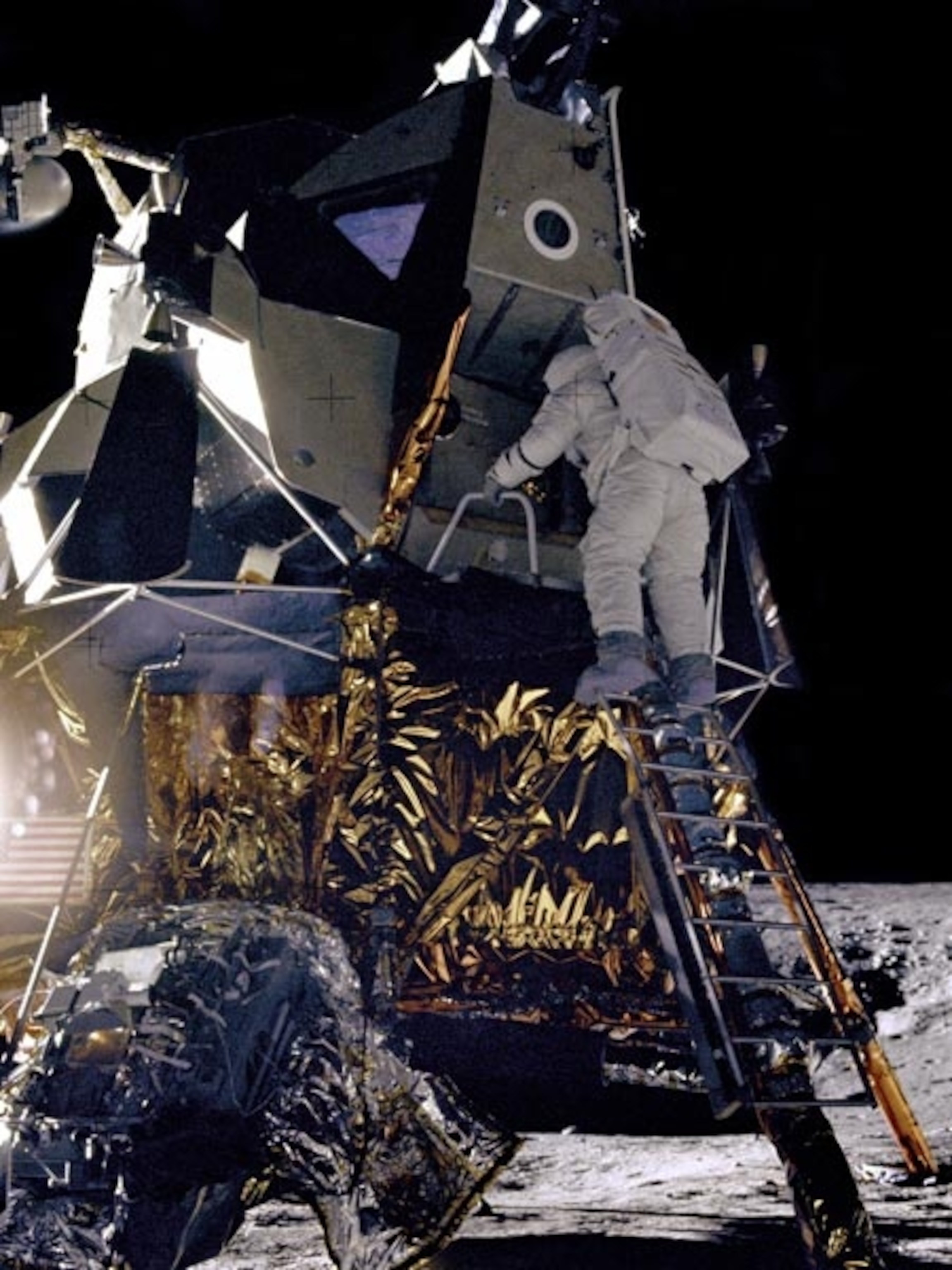 Apollo 12 astronaut descending from lunar module