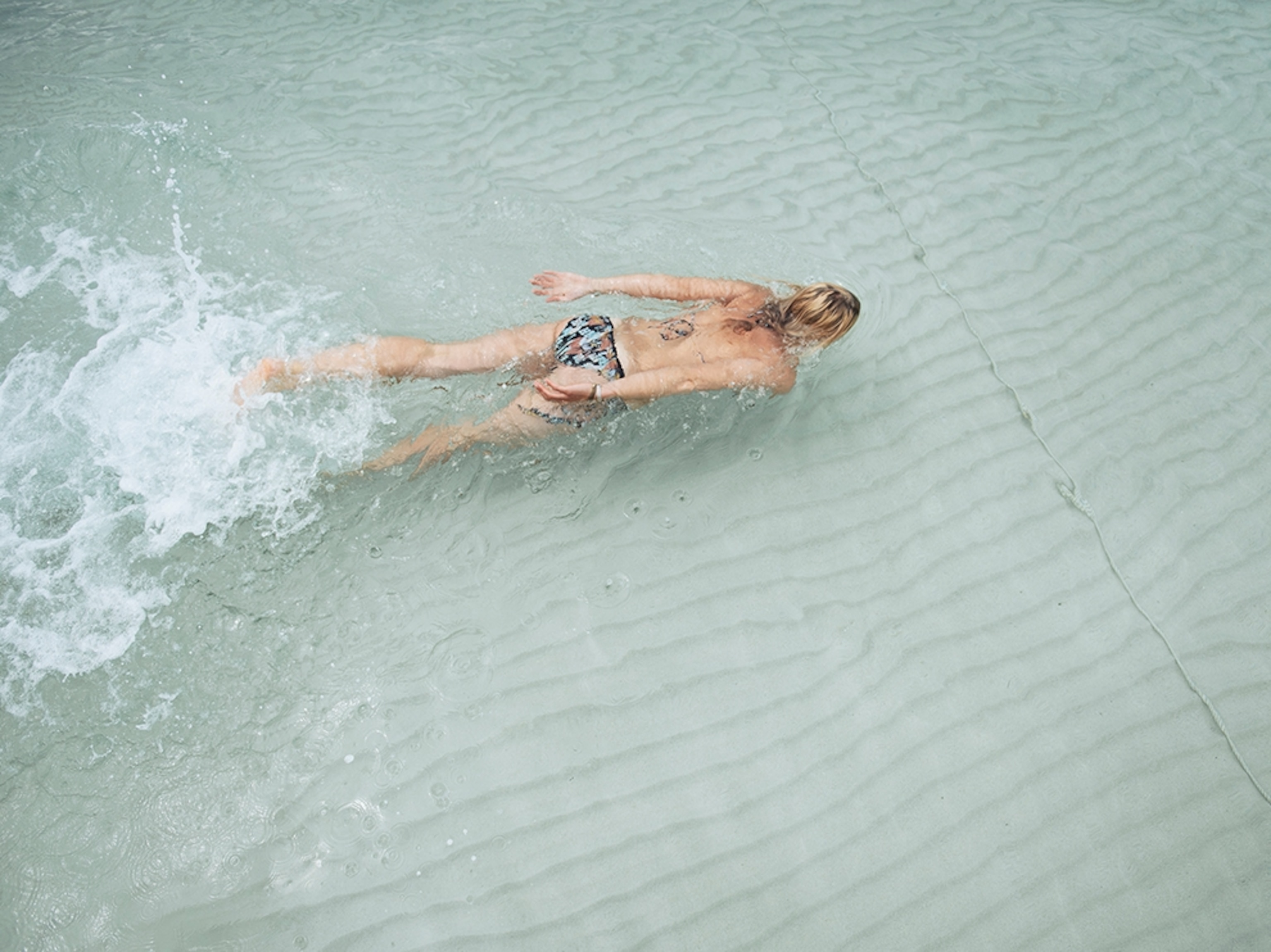 a woman swimming in the ocean in Baja, Mexico