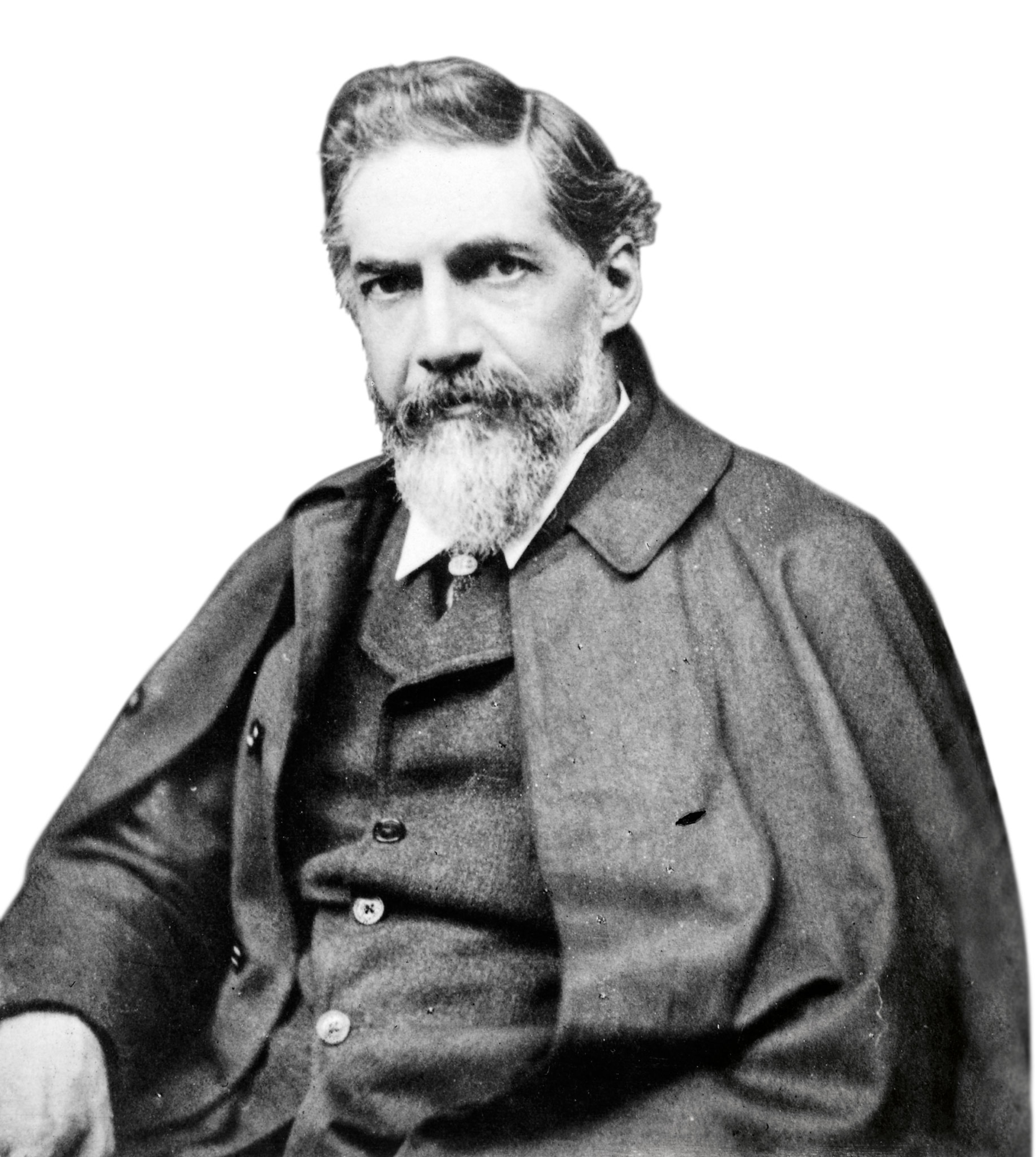 A black and white portrait of a man in a three piece suit