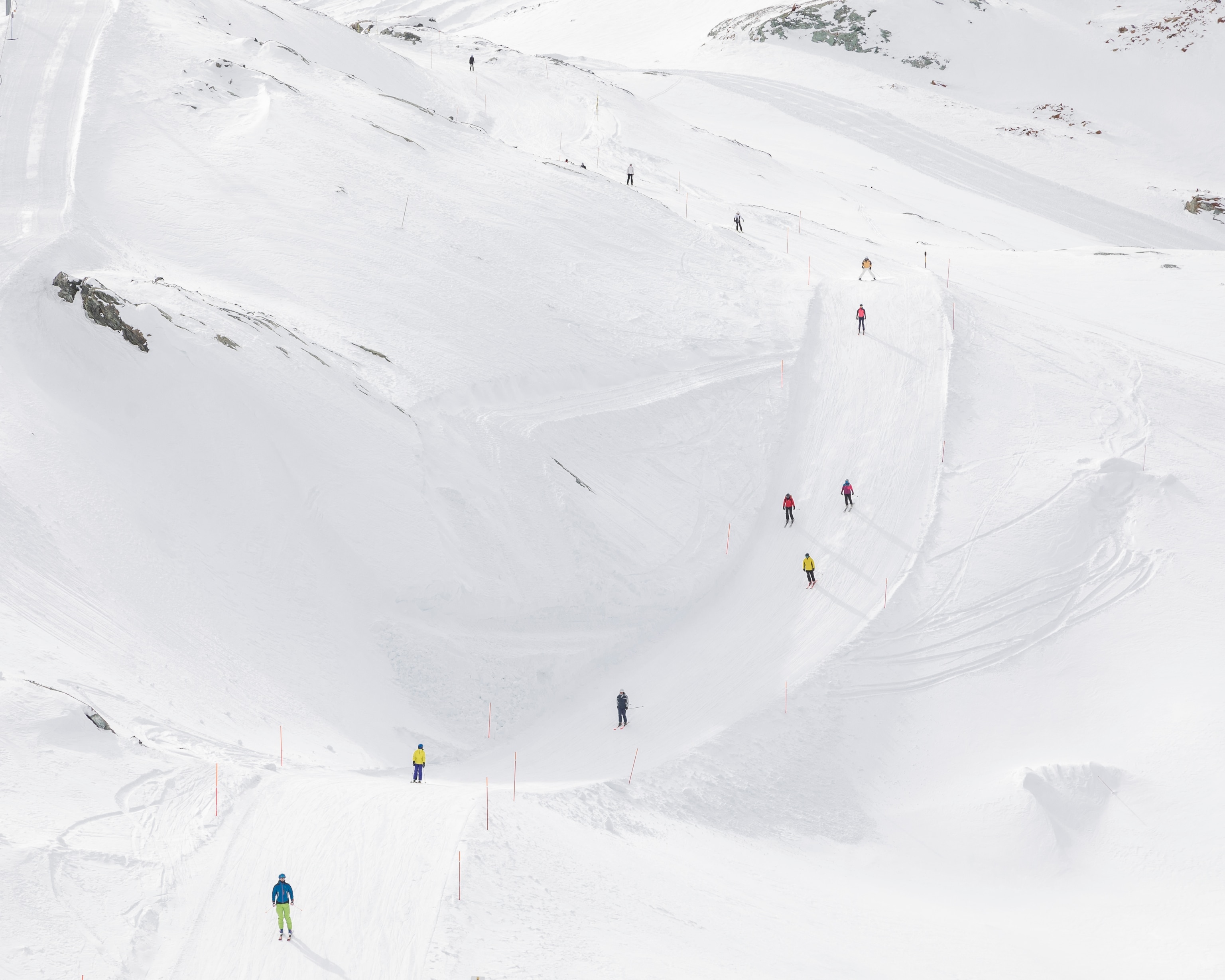 skiers on the Swiss side of the slopes in the Alps