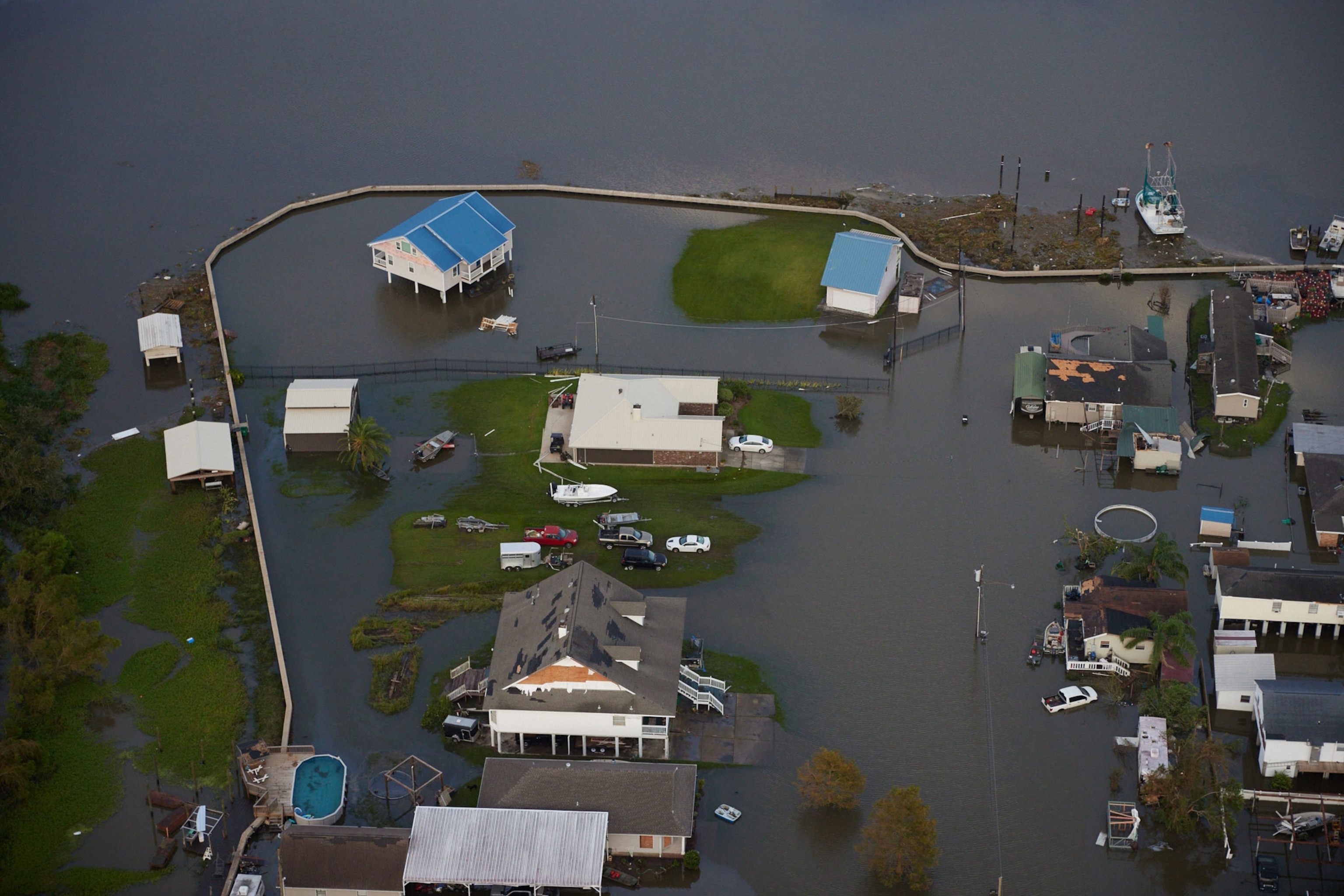 Flooding houses after hurricane Ida in Lafitte, Louisiana, a community outside of levee system.