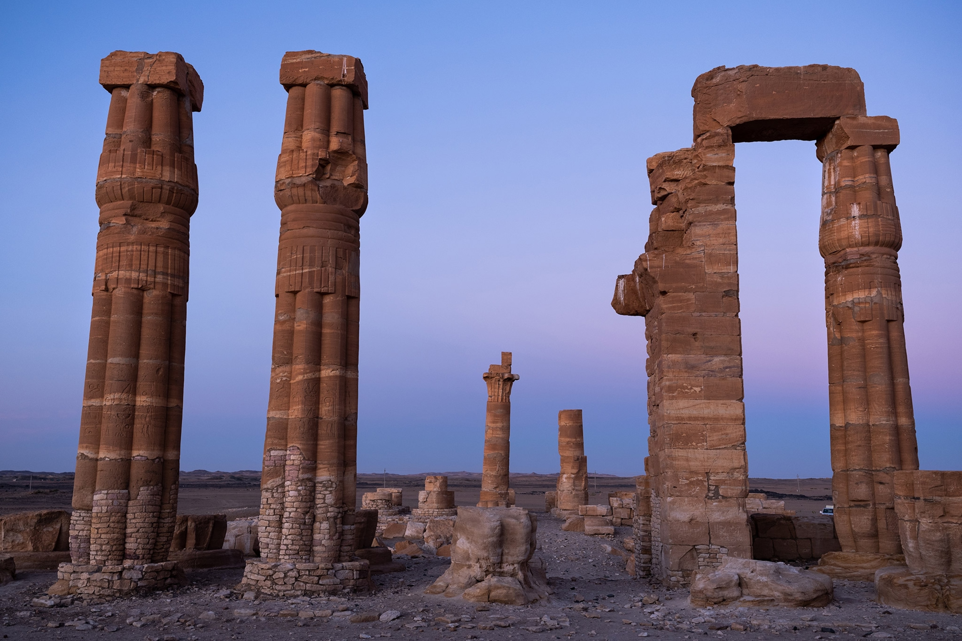 The sun rises across the temple of Soleb, built in the 14th century BC by Amenhotep III, in present-day Sudan,