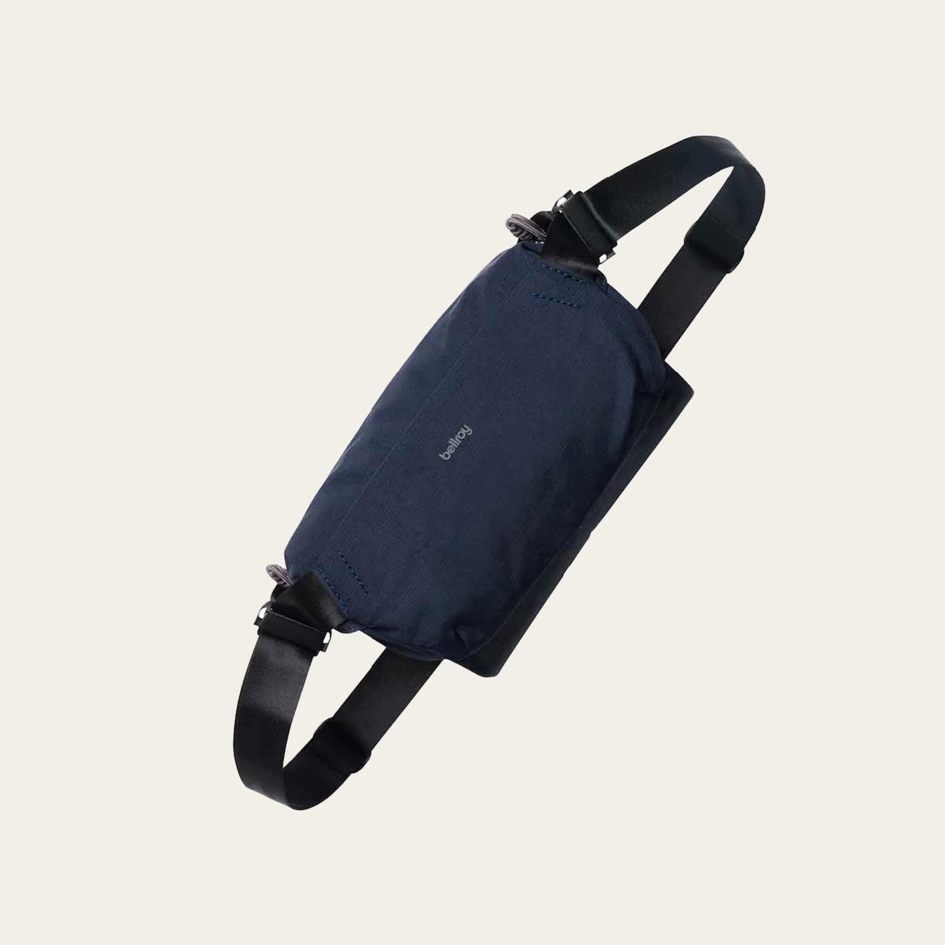 A small rectangular bag with a single strap in dark navy