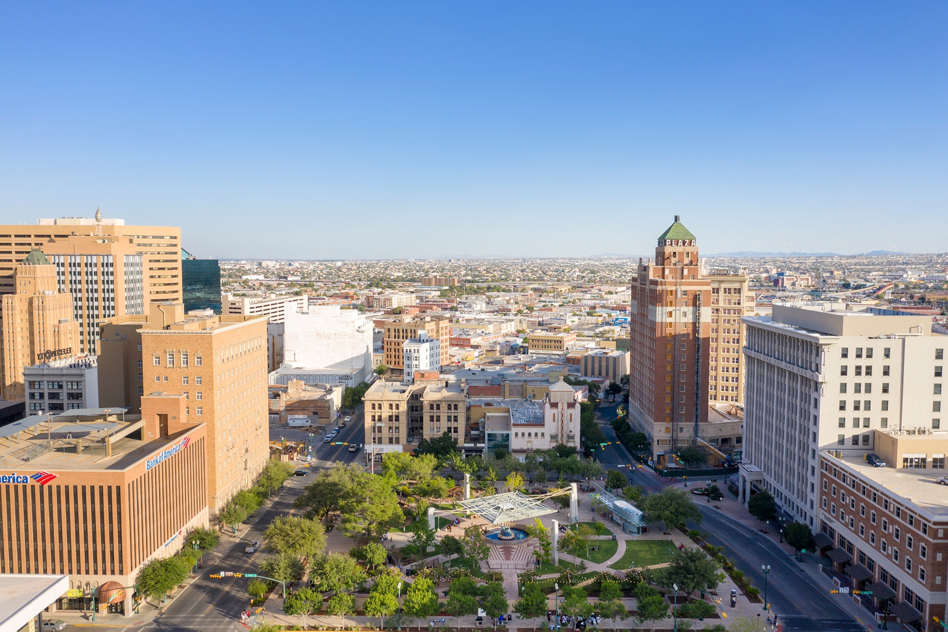 A wide shot of the city of El Paso, Texas, with San Jacinto Plaza and surrounding buildings.