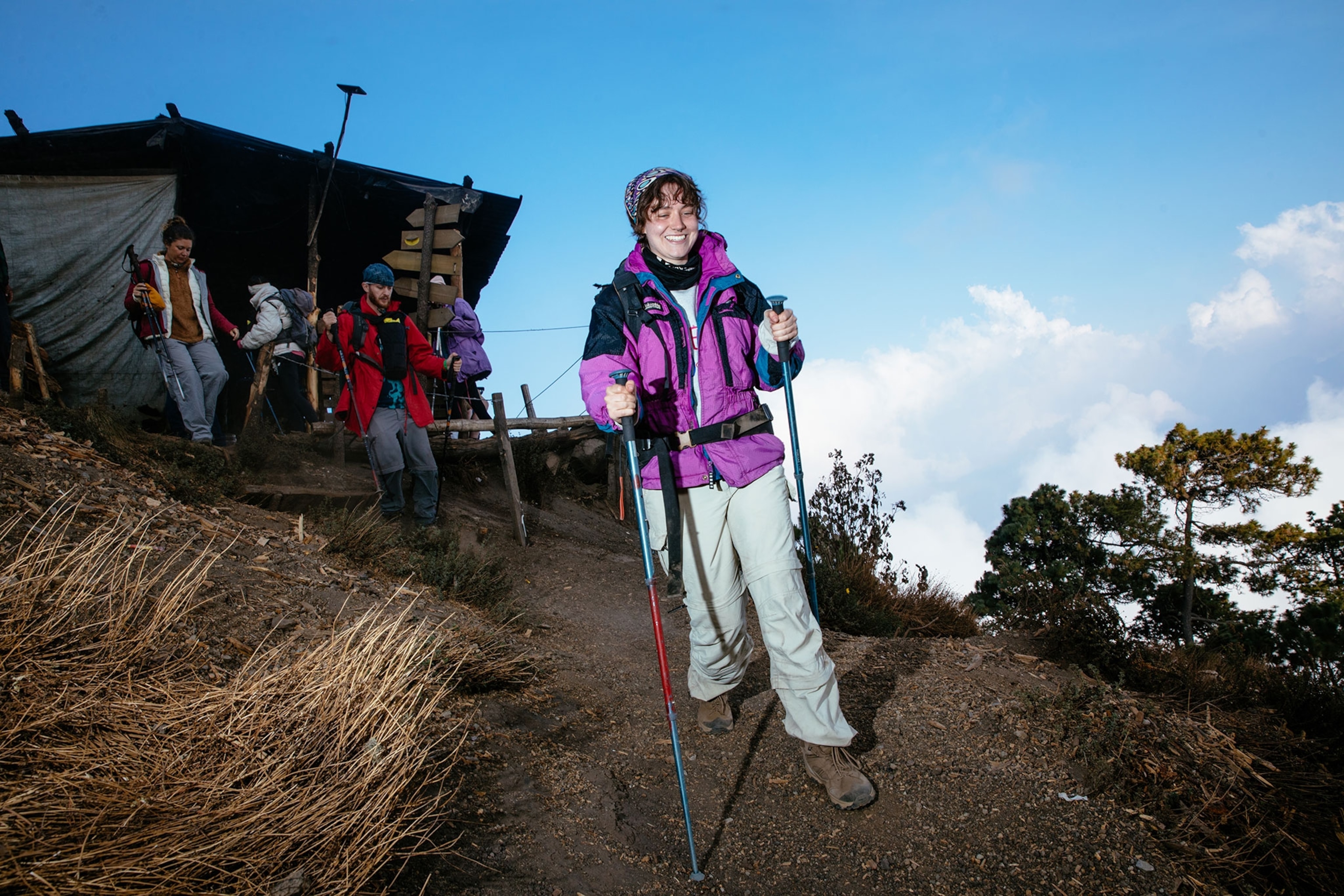 Zilia Landes hikes towards Volcán de Fuego from camp.