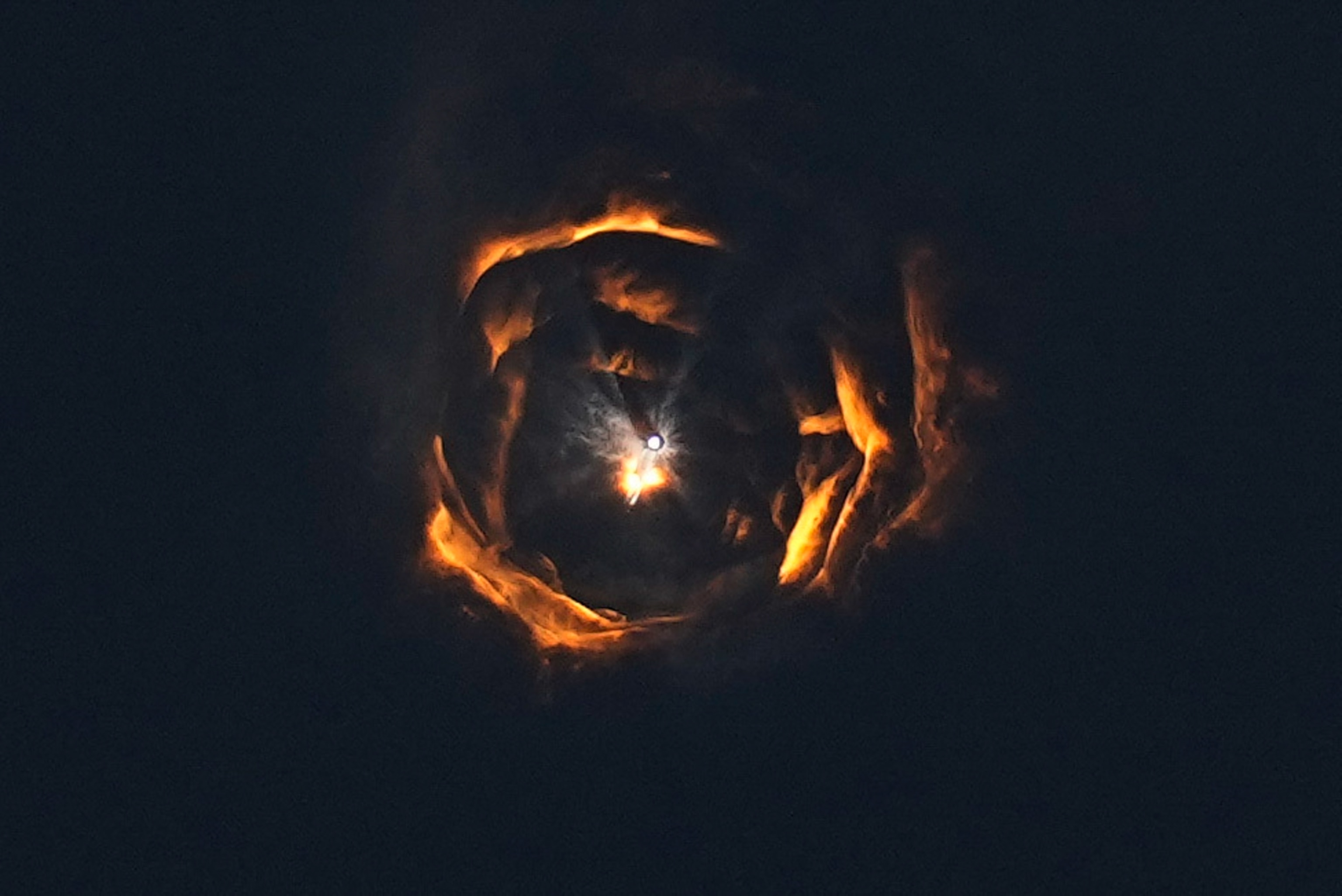 A view from below as SpaceX's mega rocket Starship breaks the sound barrier as it launches