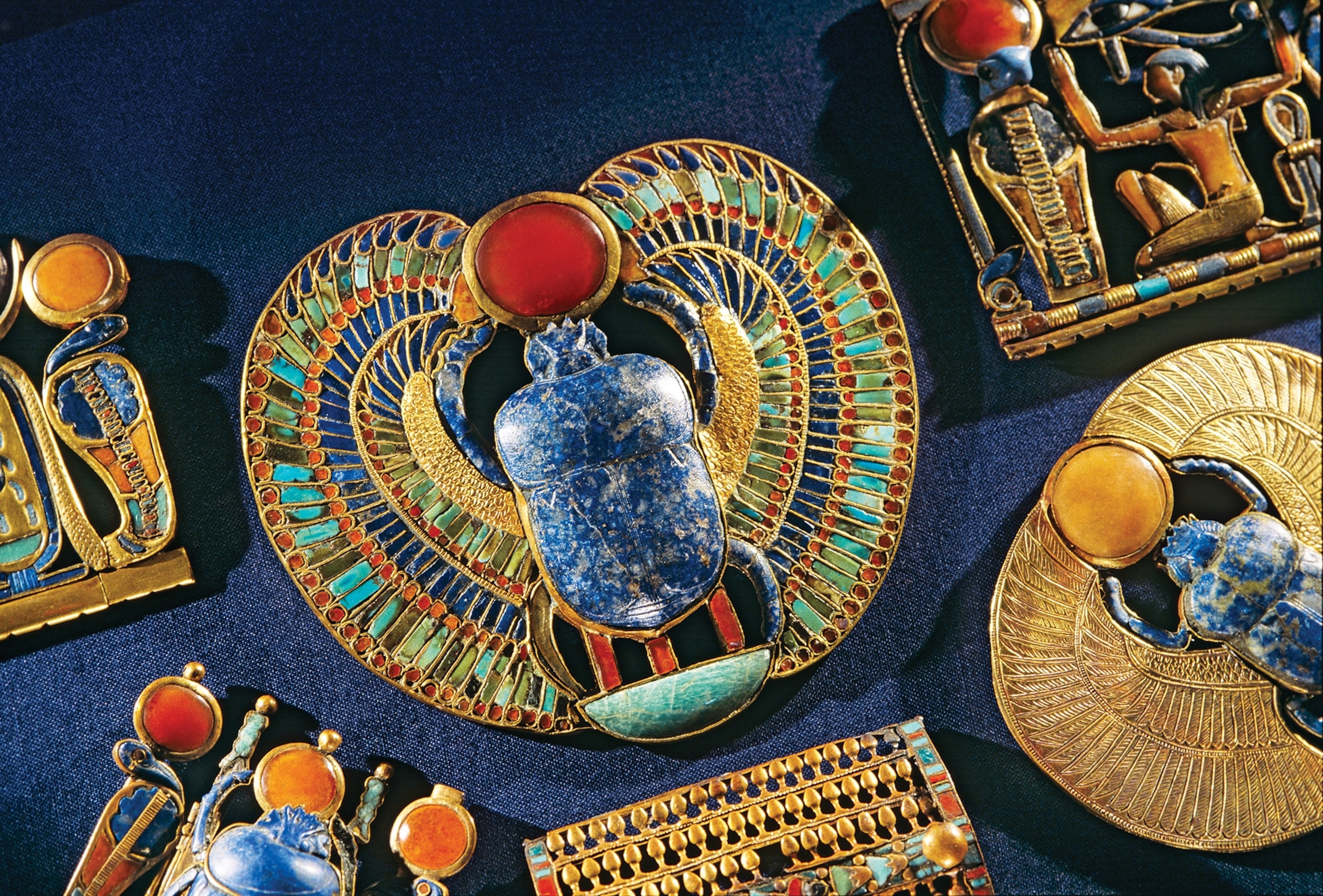 The scarab beetle, a pendant of gold and semiprecious stones, was found among the 200-plus pieces of jewelry in Tut's tomb.