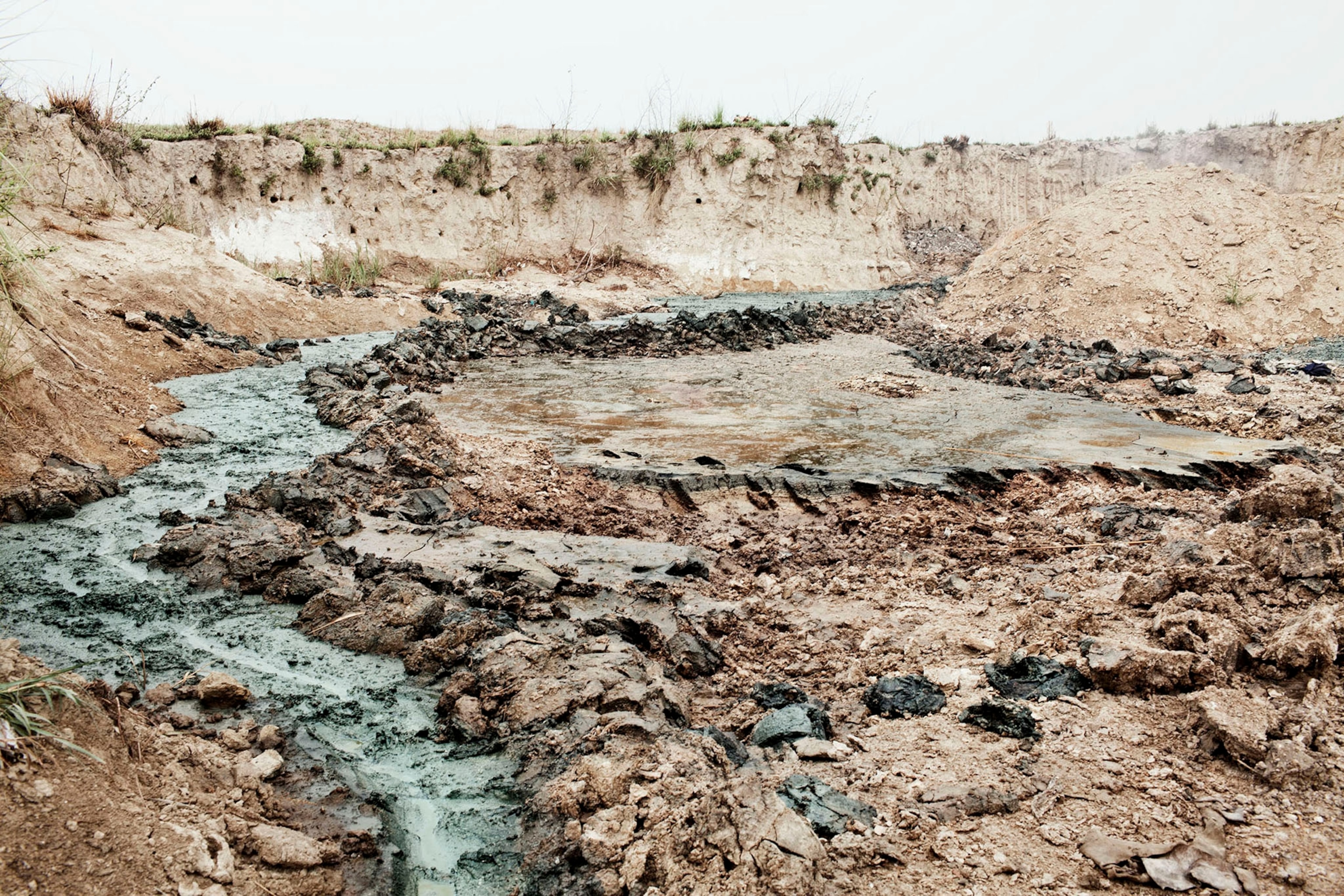 chemical spills from one of the tanneries of Kanpur, pour into the Ganges, India