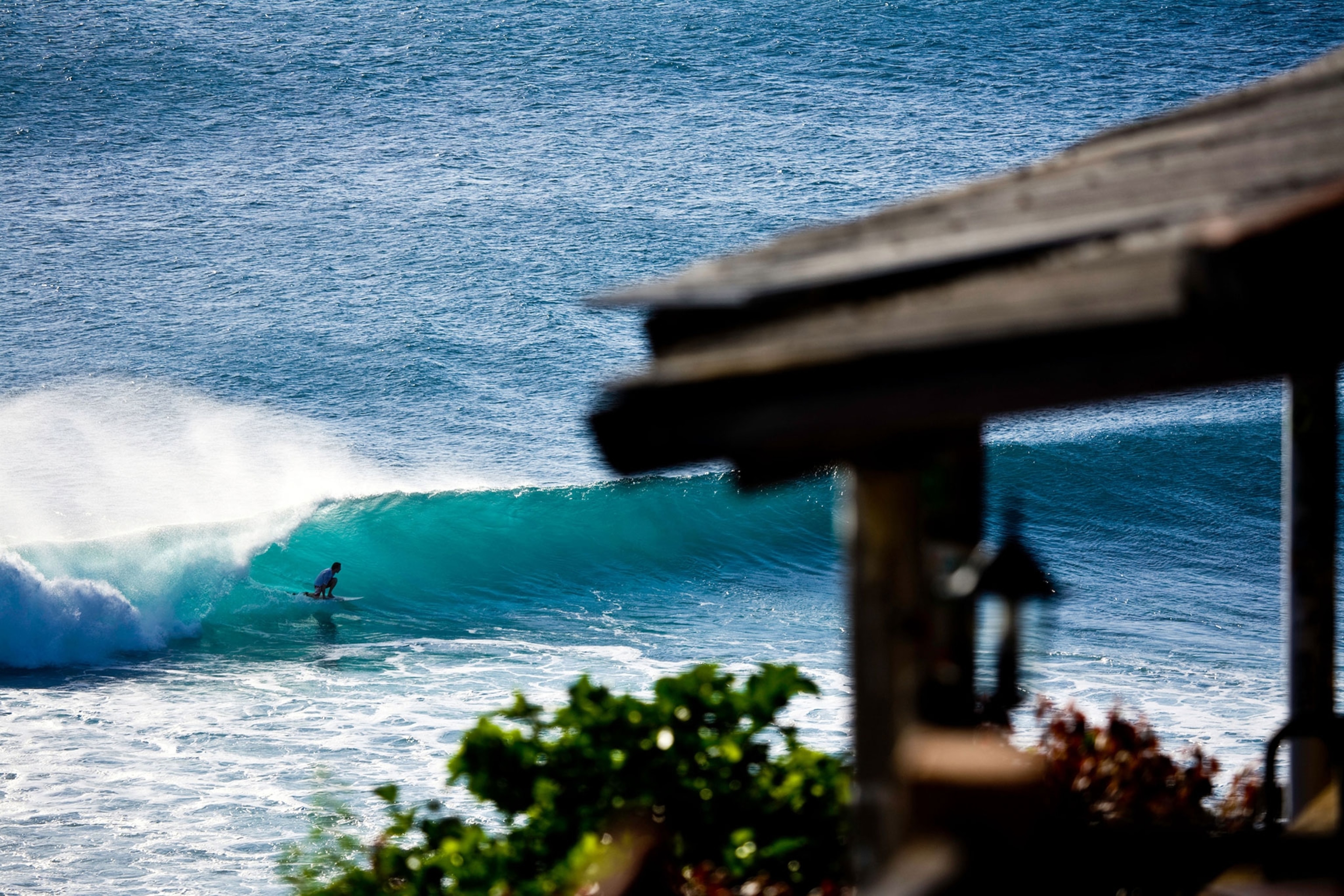a surfer on the Bukit Peninsula, Bali