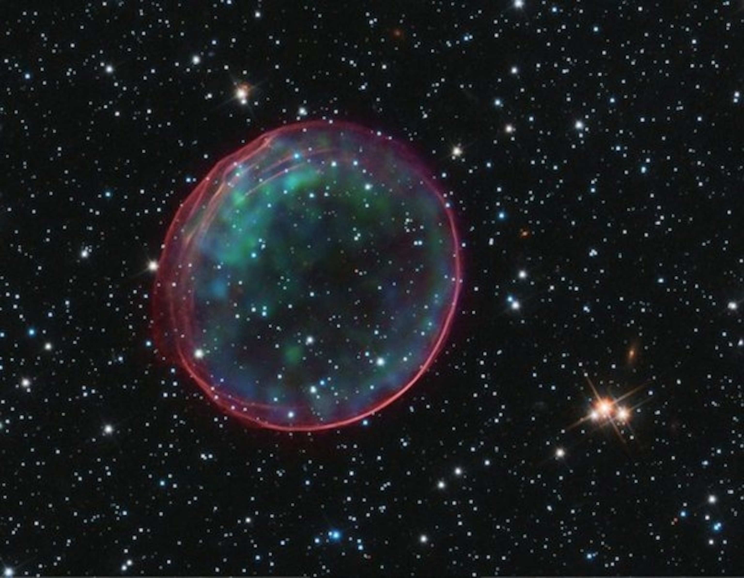 Scientists couldn't find evidence for a large, red giant companion star in supernova remnant SNR0509-67.5, in the Large Magellanic Cloud. (NASA/CXC/SAO/J.Hughes/ESA/Hubble Heritage Team)