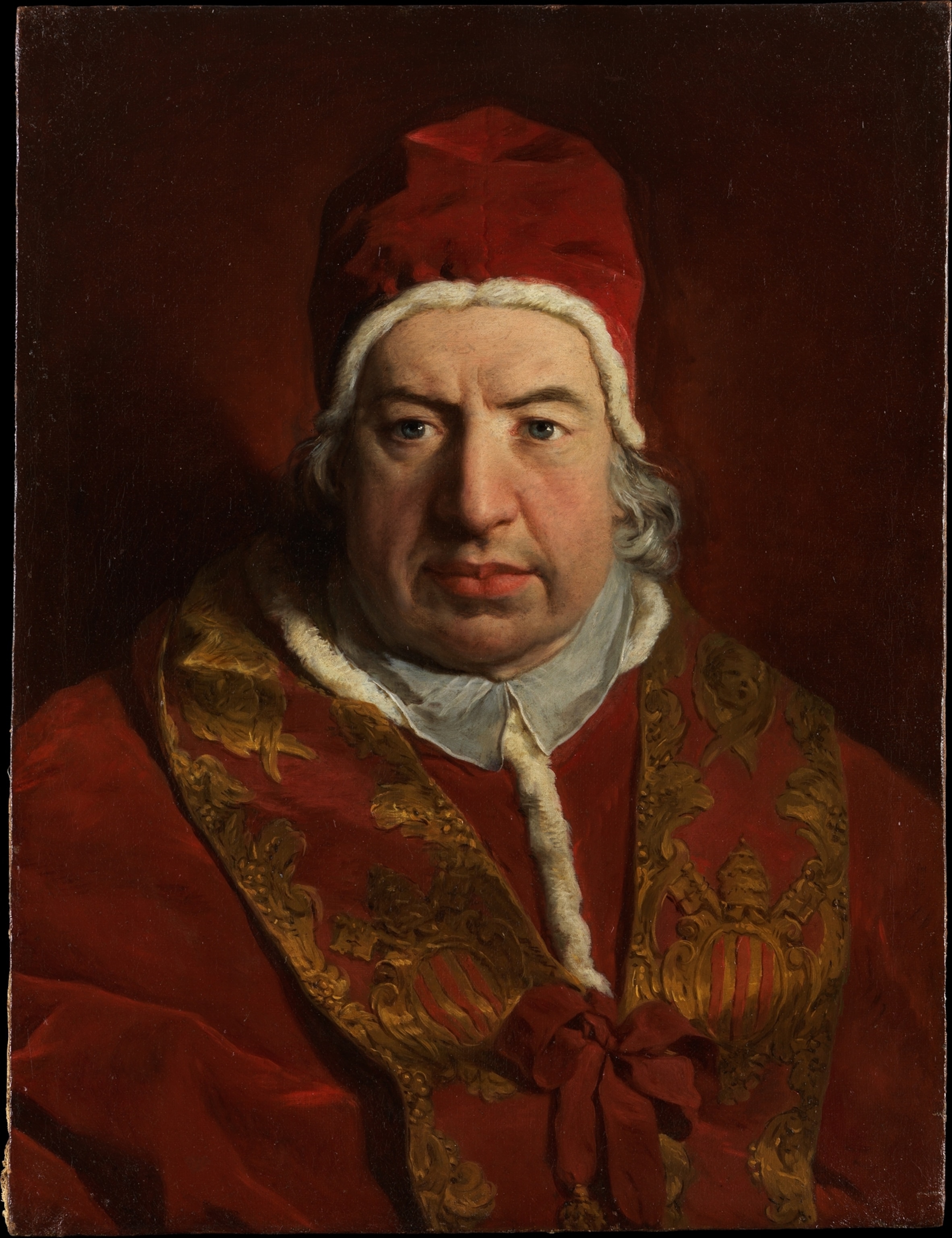 A deep red background and portrait.