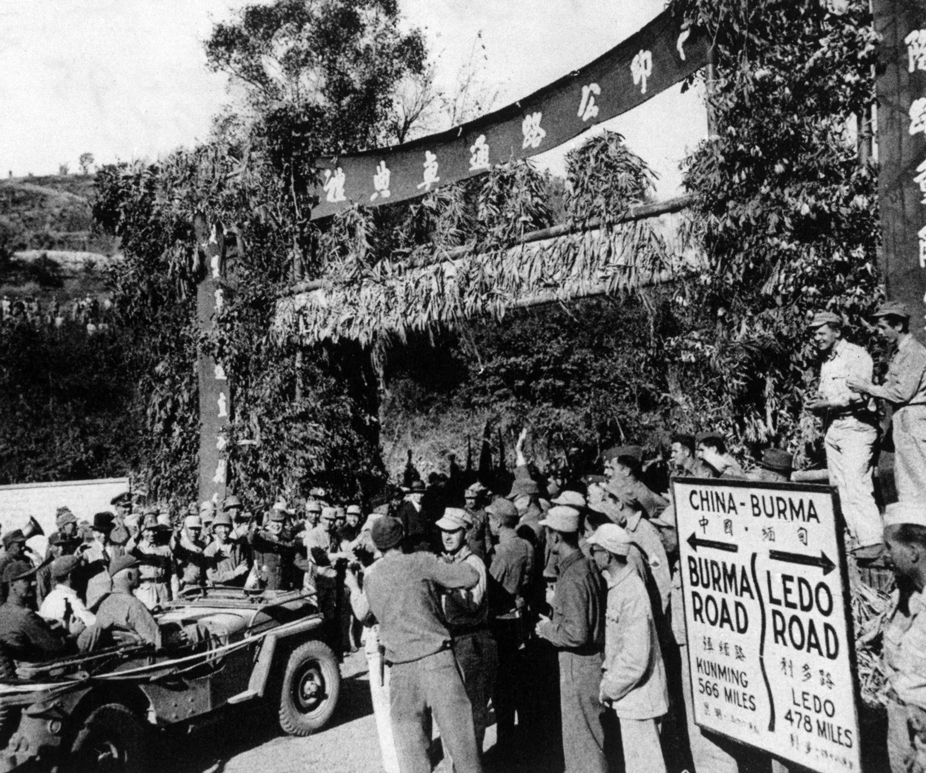 Photo of men gathered on new road
