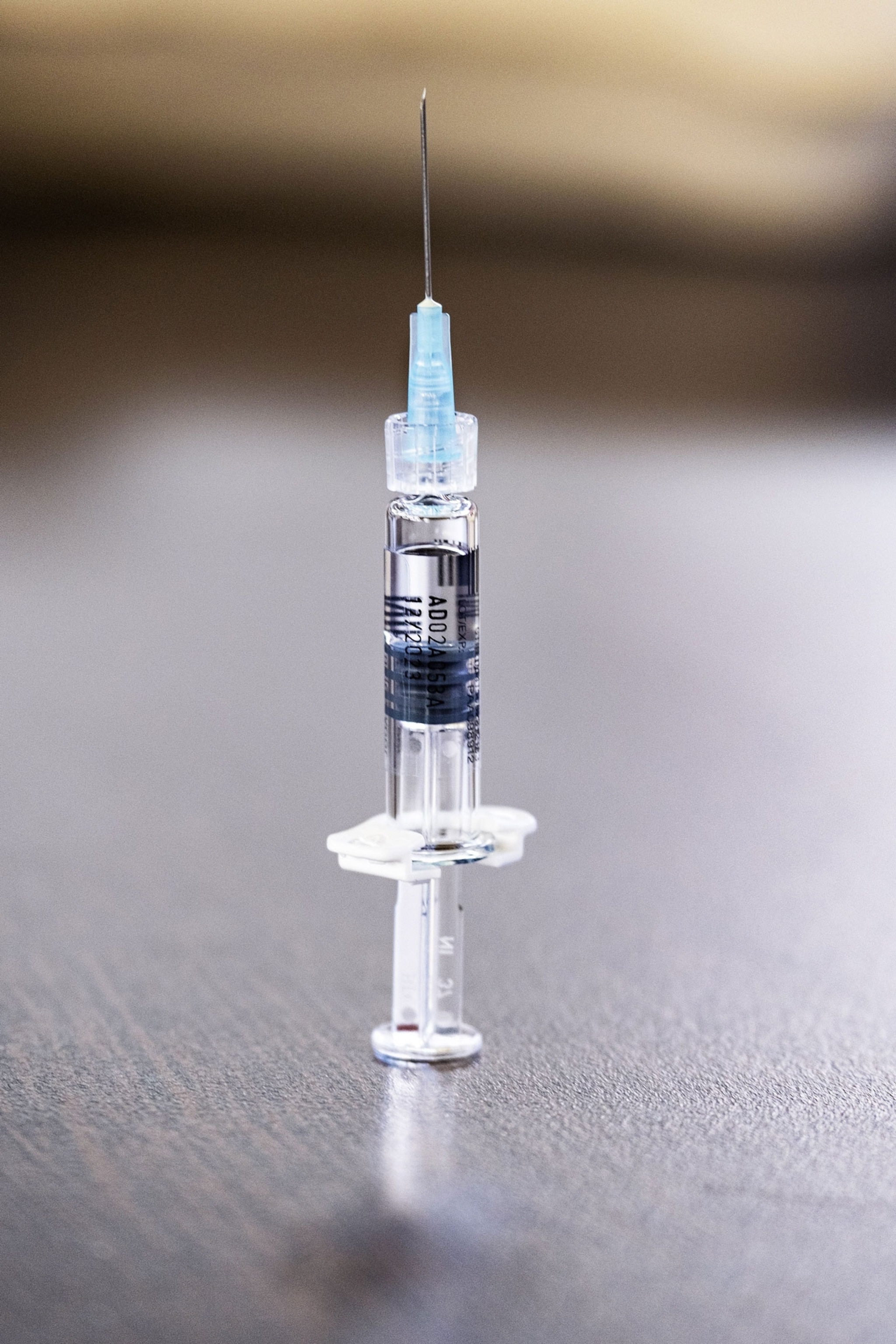 a syringe with a clear liquid in it