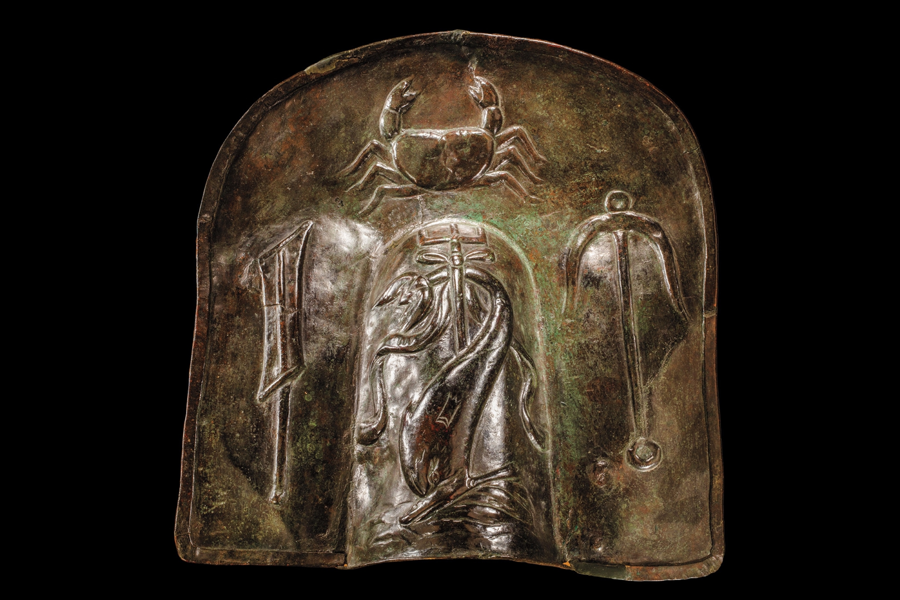 Decorated with marine life, this high neck guard was worn on the shoulder by a retiarius, who fought with a net and trident.