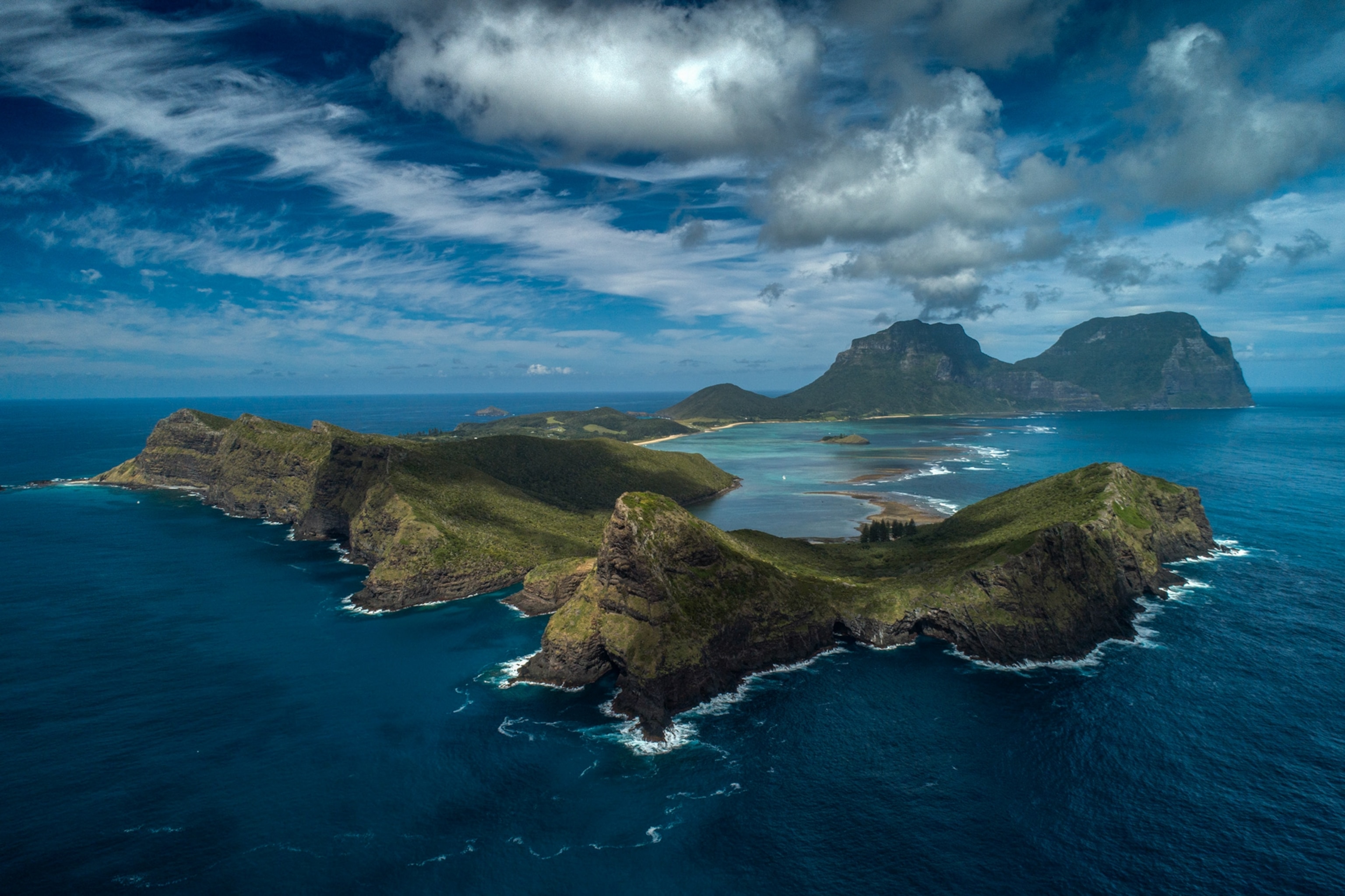 a landscape view of the crescent shape of Lord Howe Island