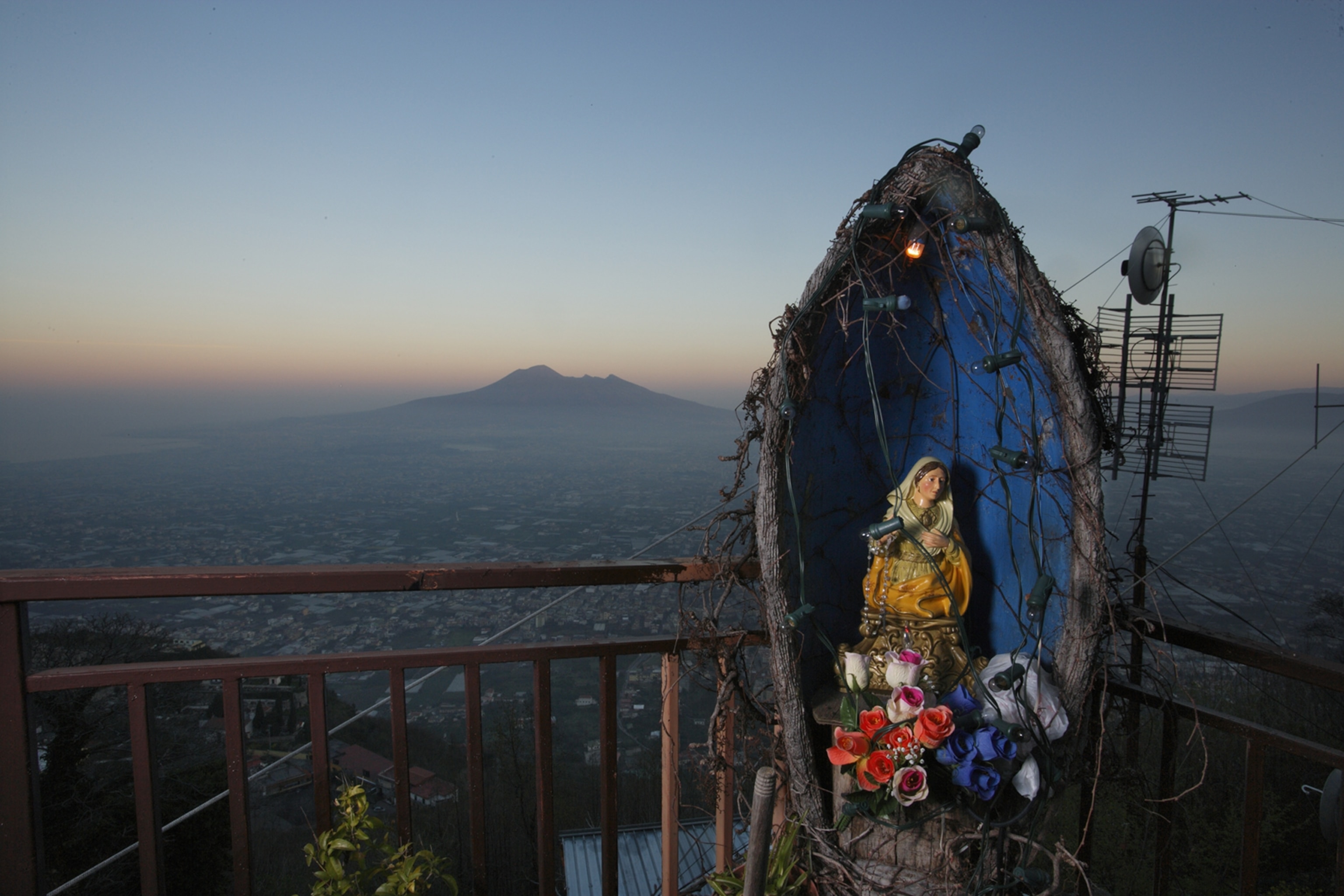 a small shrine stands in a community just outside the Vesuvius Red Zone