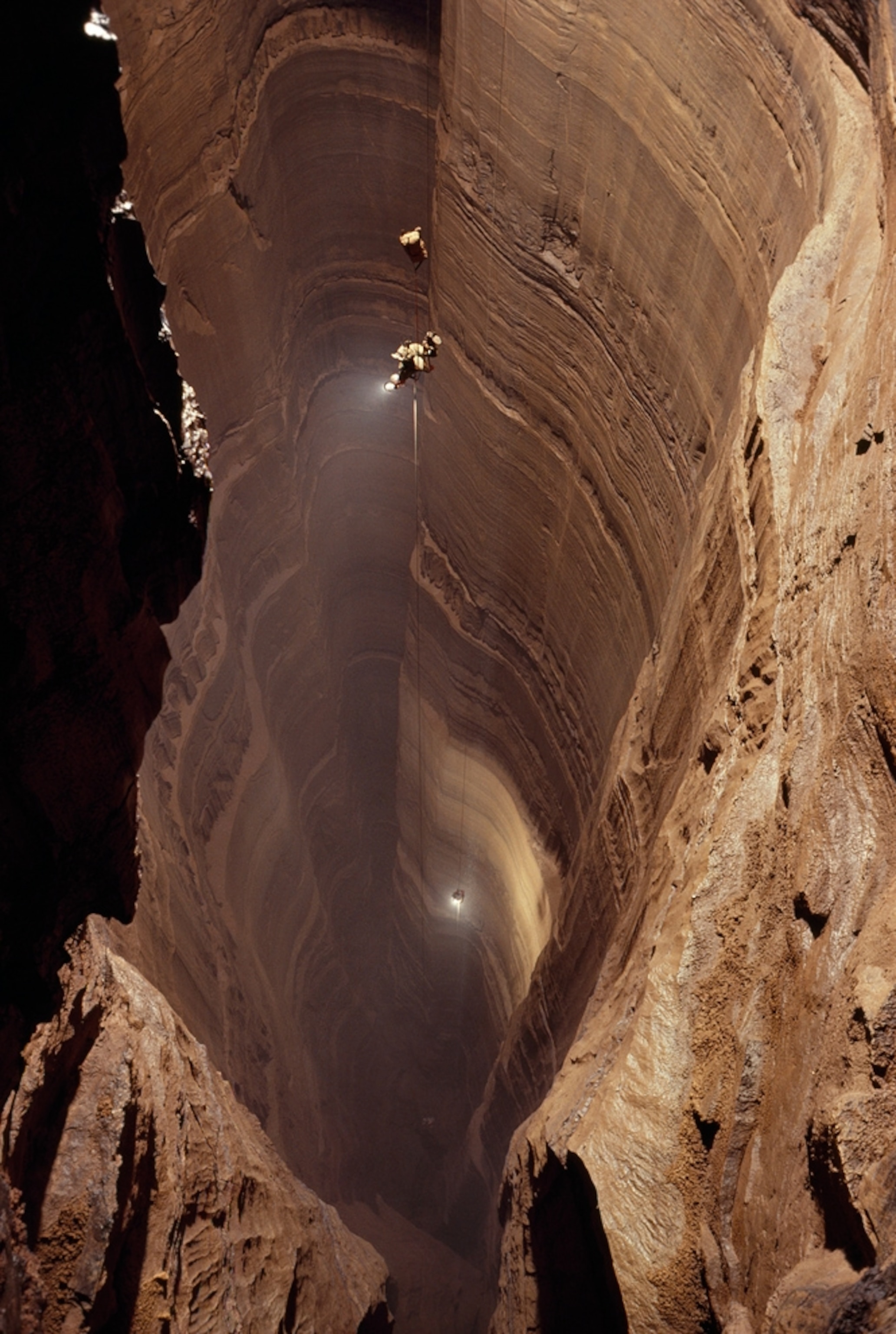Group of cavers descends into Ellison's Cave