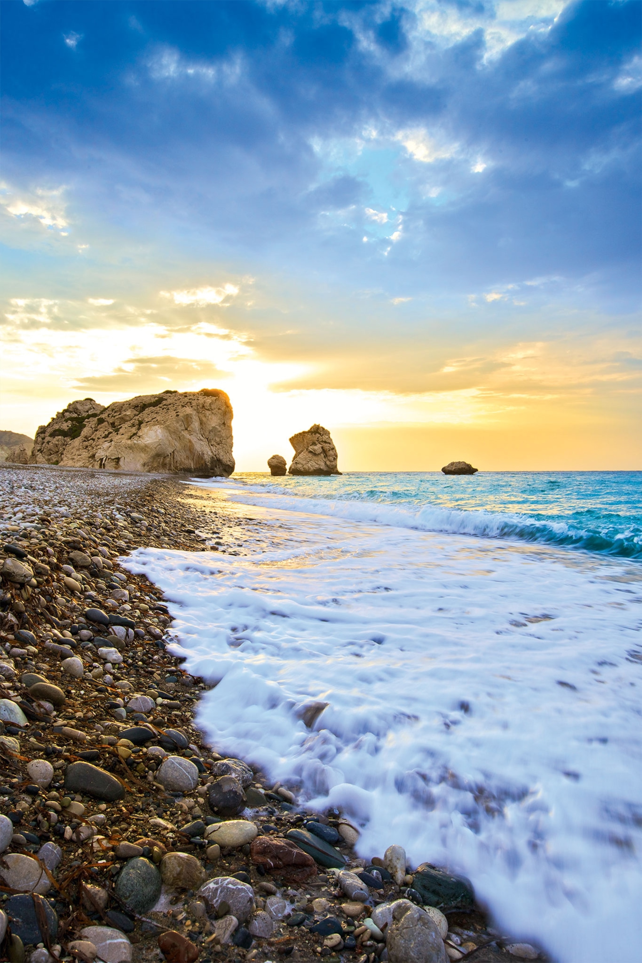 A view of a beach and sea stack on the coast of Cyprus
