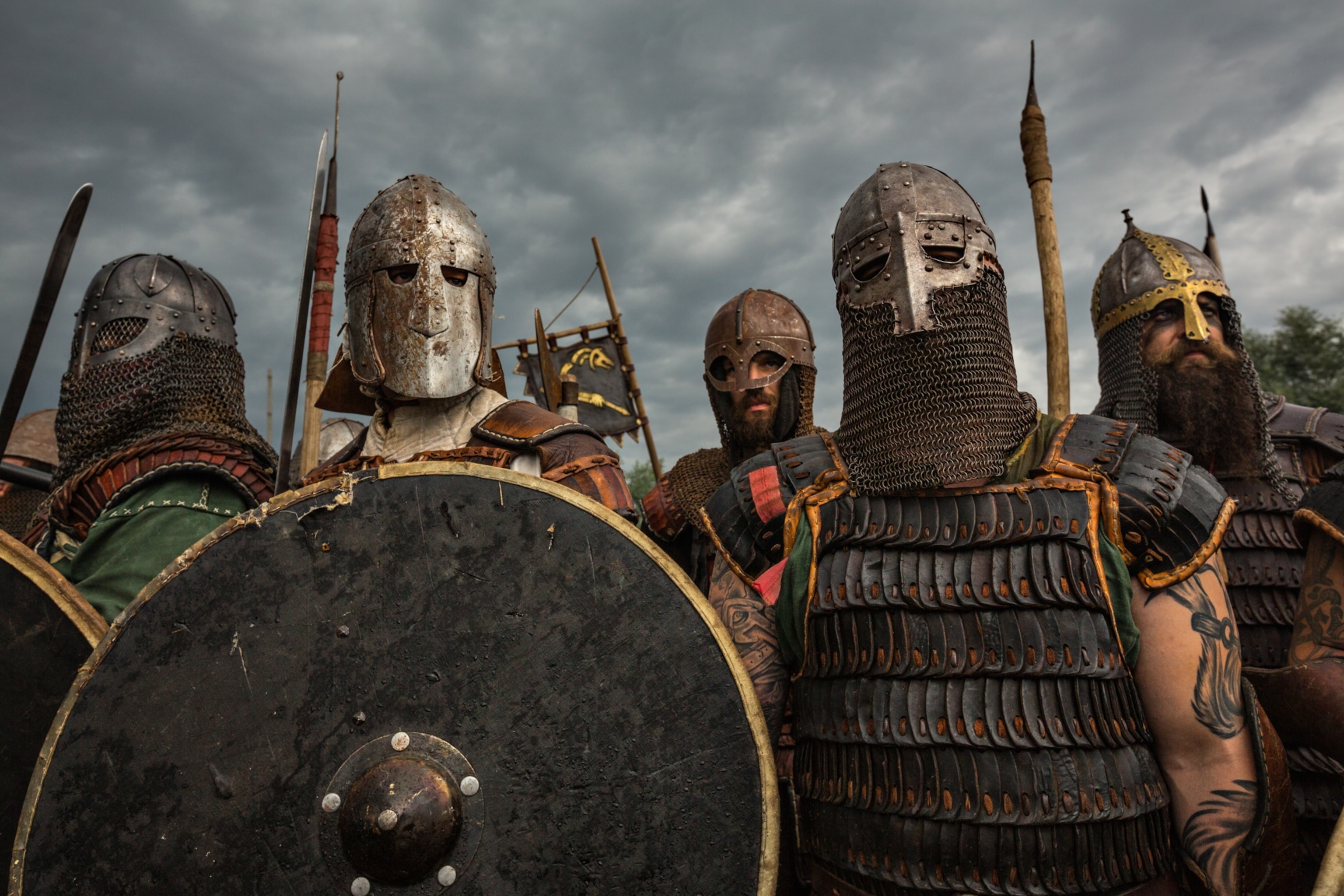 Reenactors don armor in preparation for close combat during the Festival of Slavs and Vikings in Wolin, Poland.