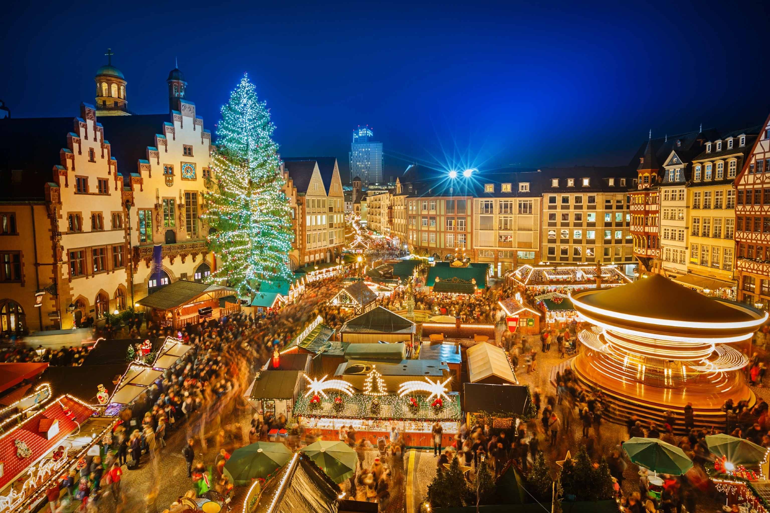 Christmas market in Frankfurt is illuminated by light decoration