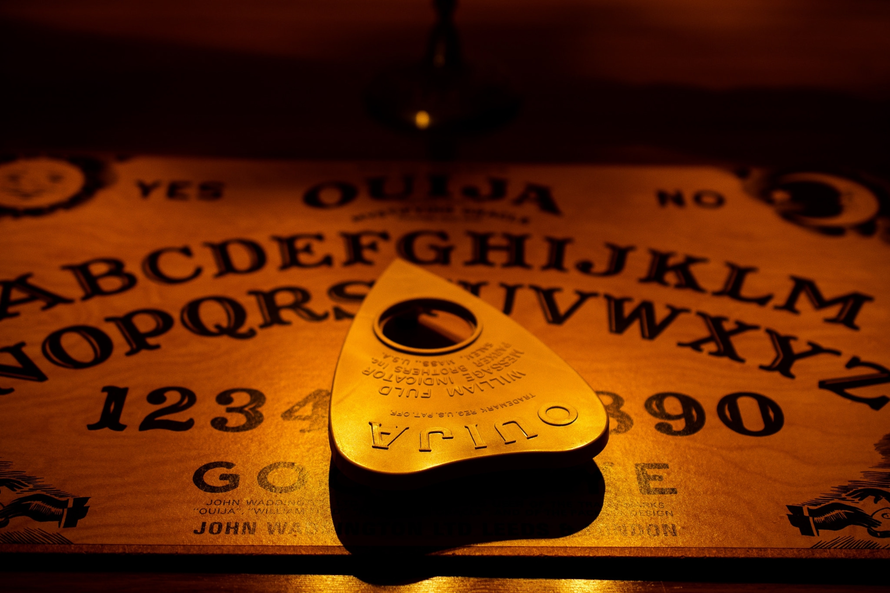 A close up view of a Ouija board.