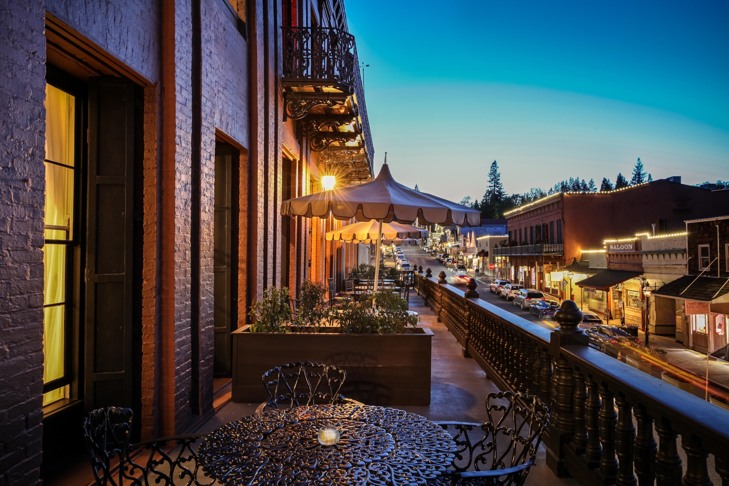A view of the National Exchange Hotel terrace overlooking a main street in Nevada City, California.