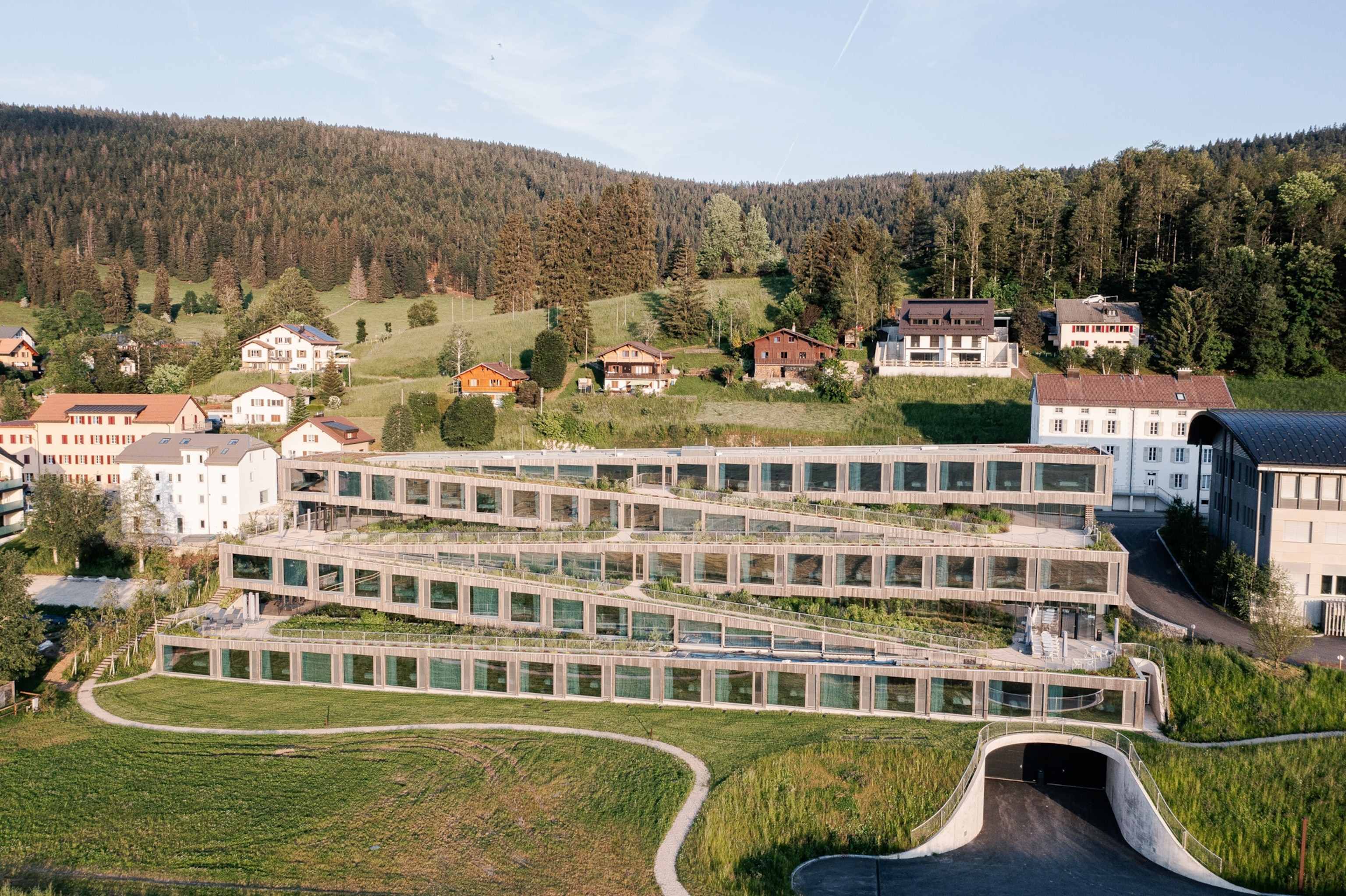 An aerial view of the 50-room Hôtel des Horlogers in the Joux Valley of Switzerland.