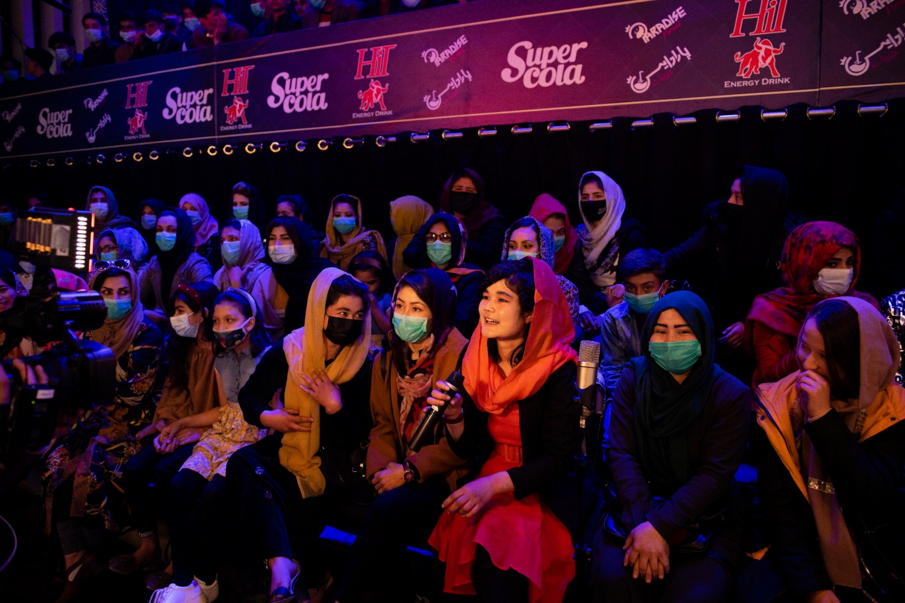 people attend a recording of the show Afghan Star in Kabul