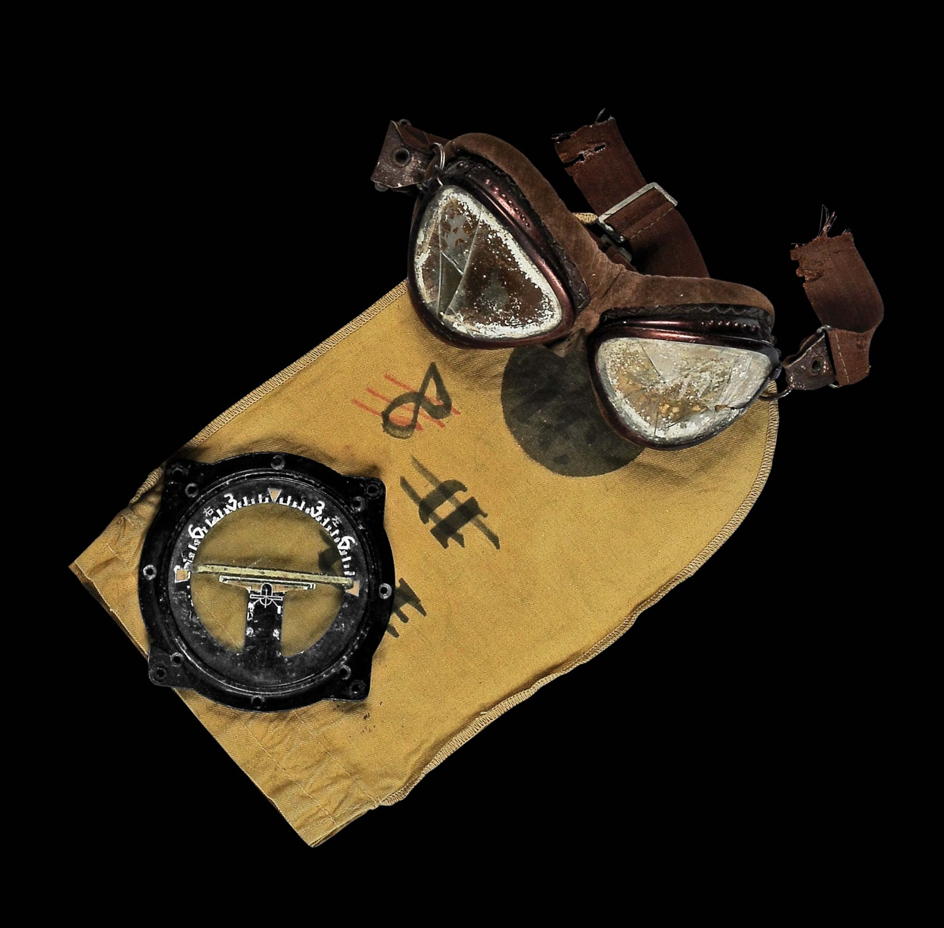 Brown goggles worn by a Japanese pilot