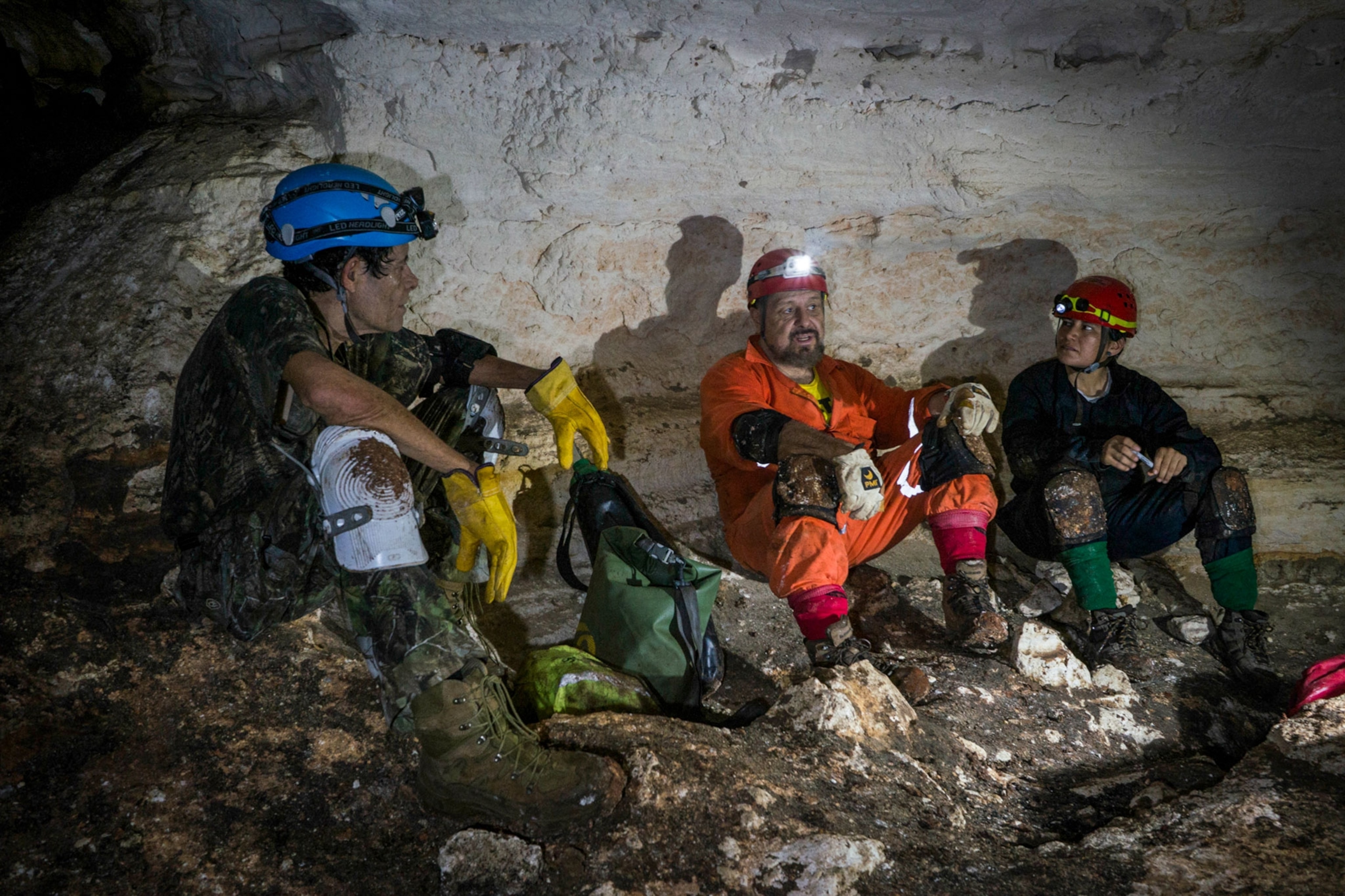 researchers taking a break inside caves in Mexico
