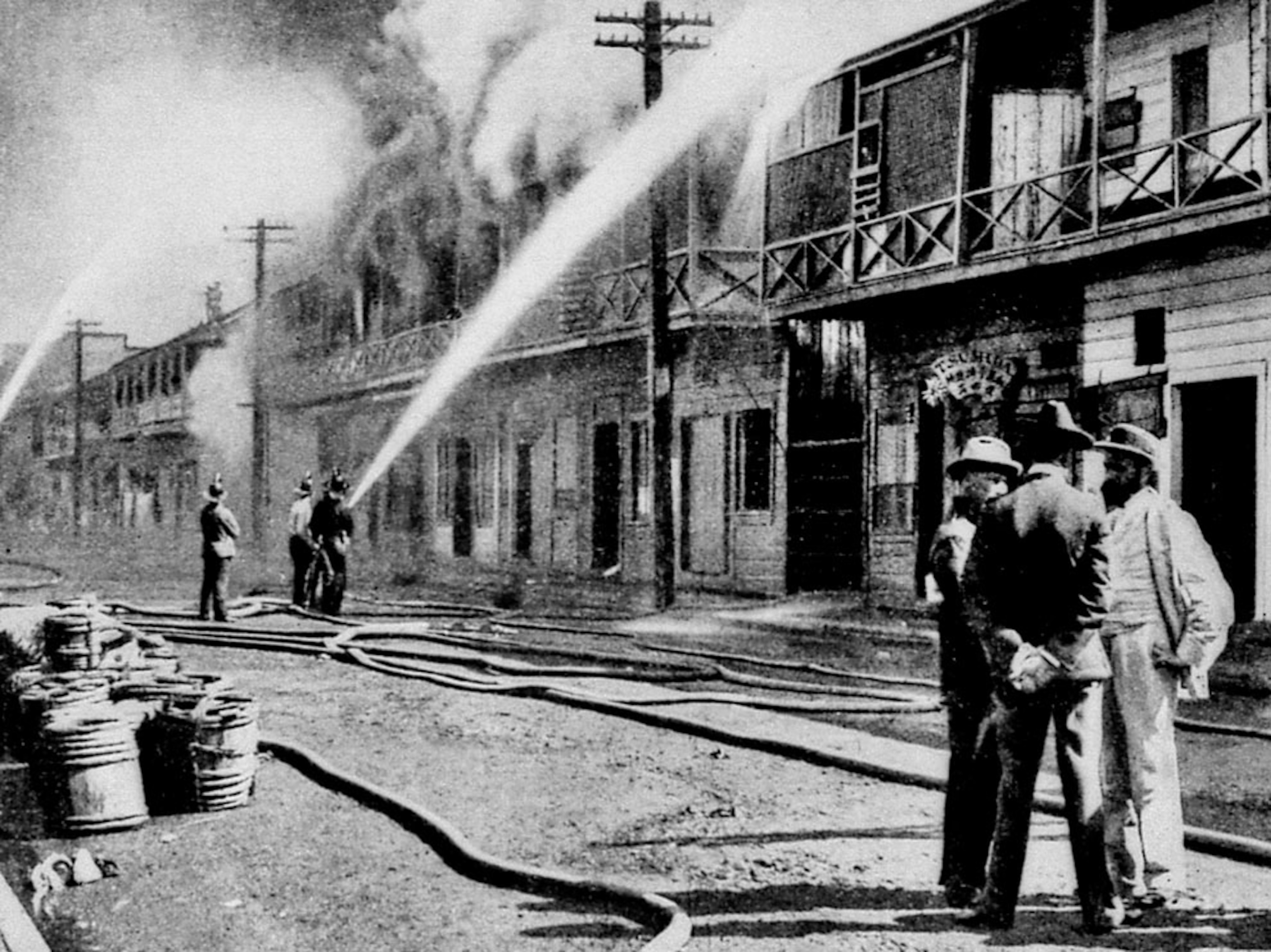 A home being burned in Honolulu, Hawaii circa 1900