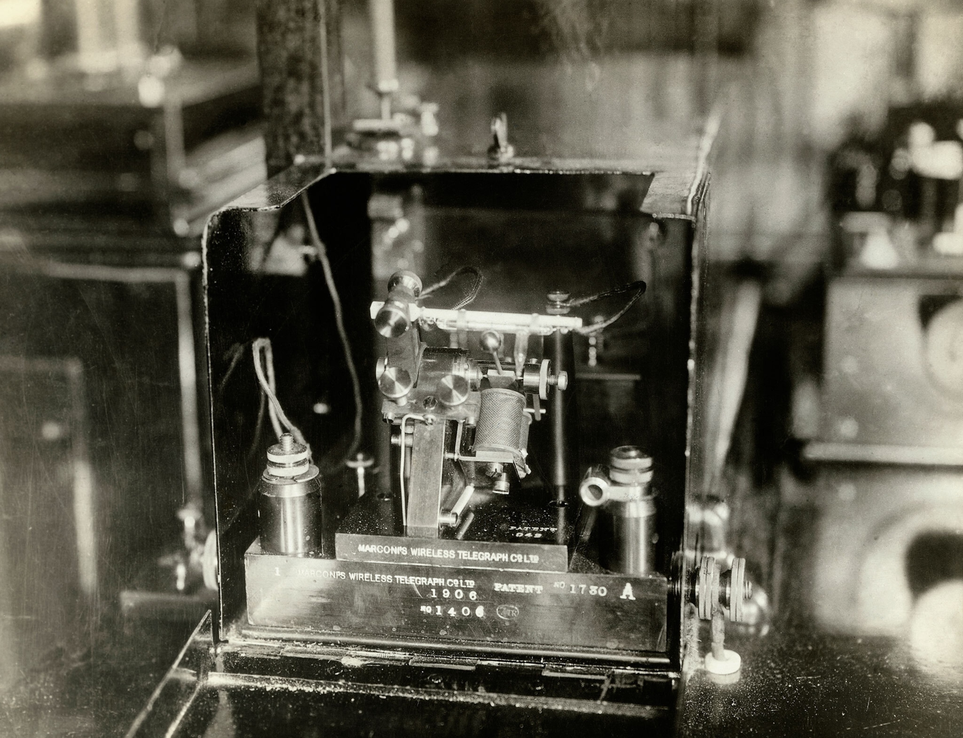 a small boxy metal telegraph machine