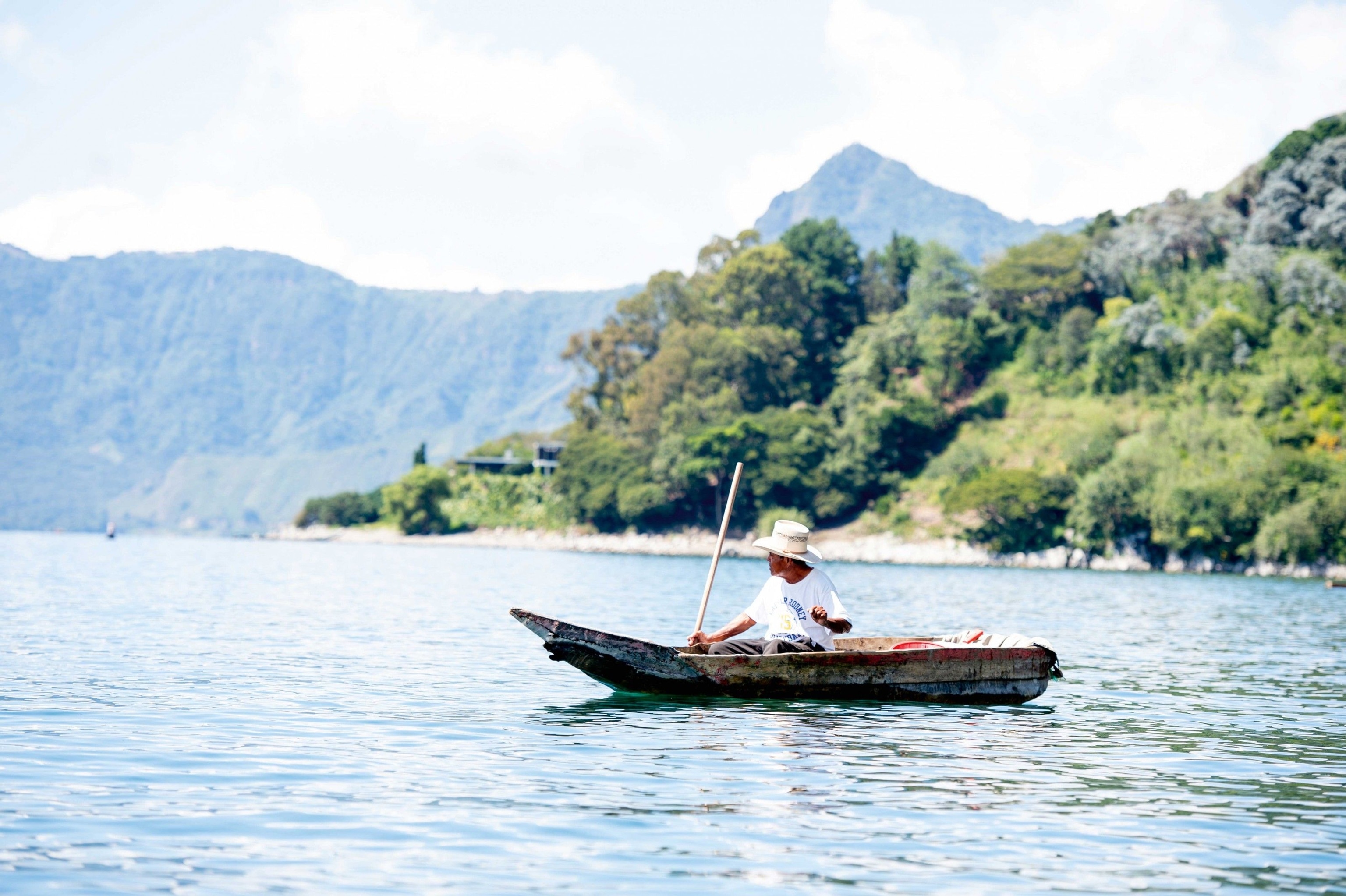 A fisherman in a traditional canoe, Lake Atitlán.