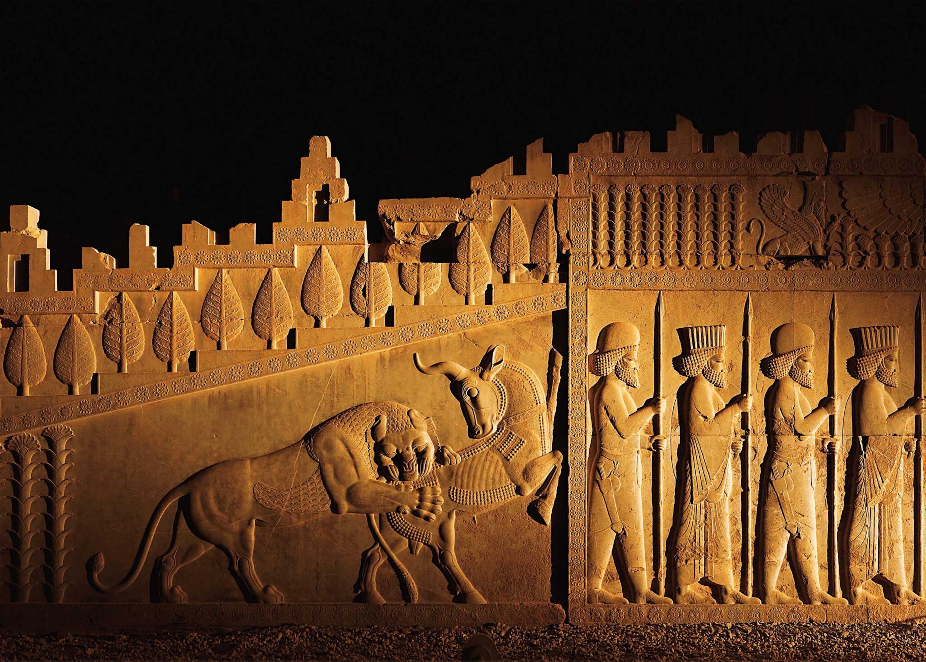 a rock carving depicting Persian and Median soldiers returning from battle