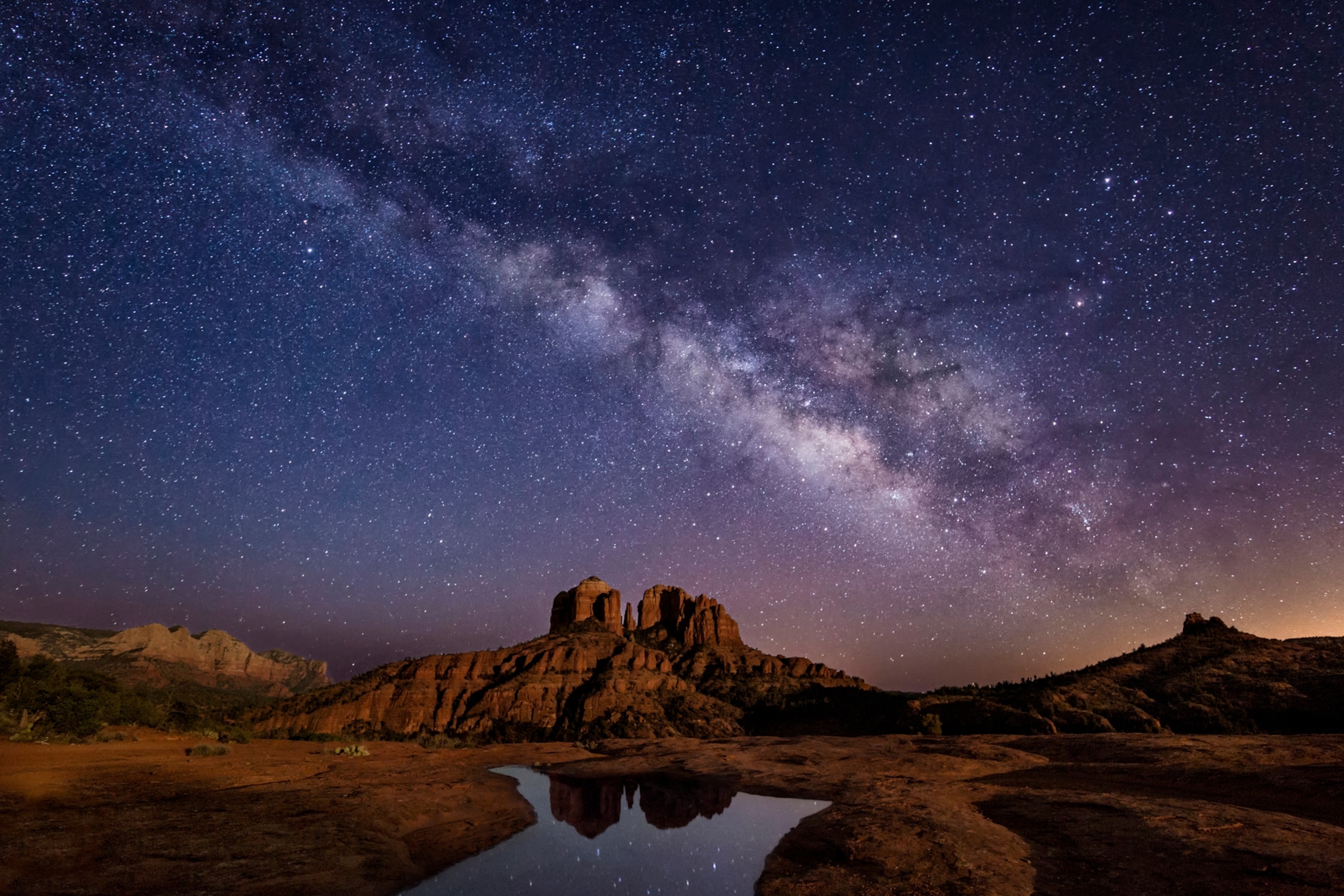 the Milky Way above Cathedral Rocks in Sedona, Arizona
