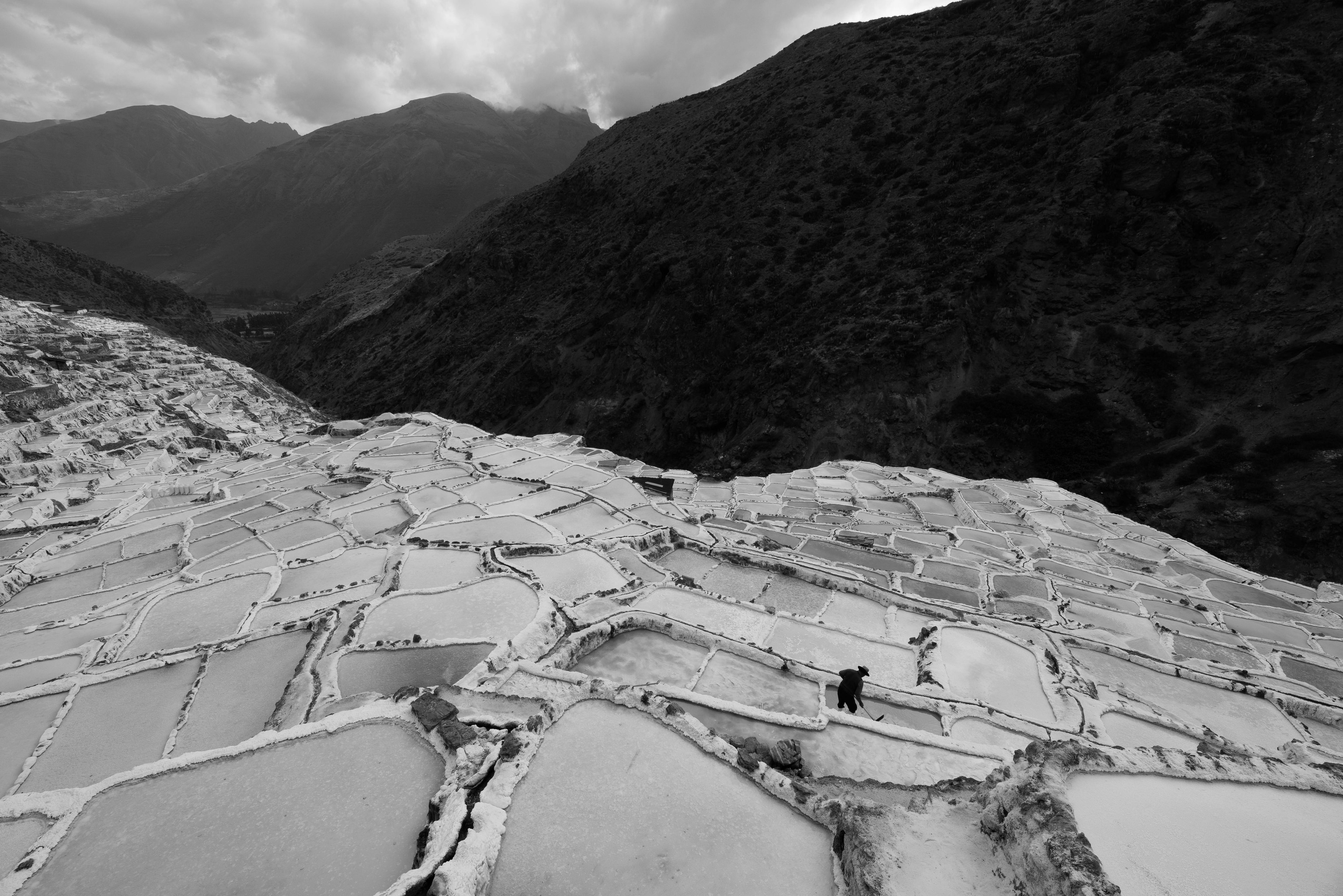 Salt wells terraced into the hillside at the Salt Mine of Maras in Peru are pictured