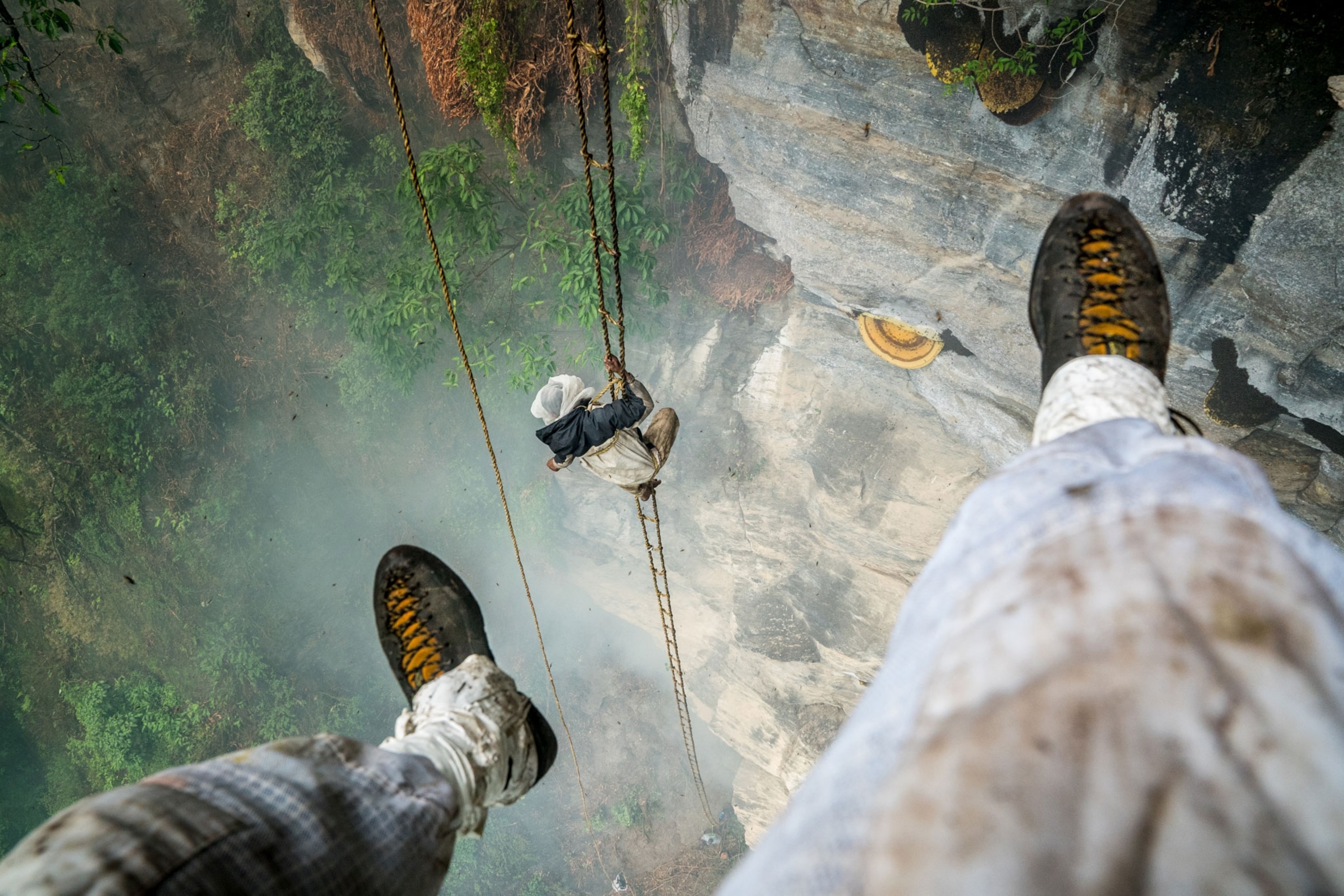 Renan Ozturk’s self portrait of his feet dangling in mid-air