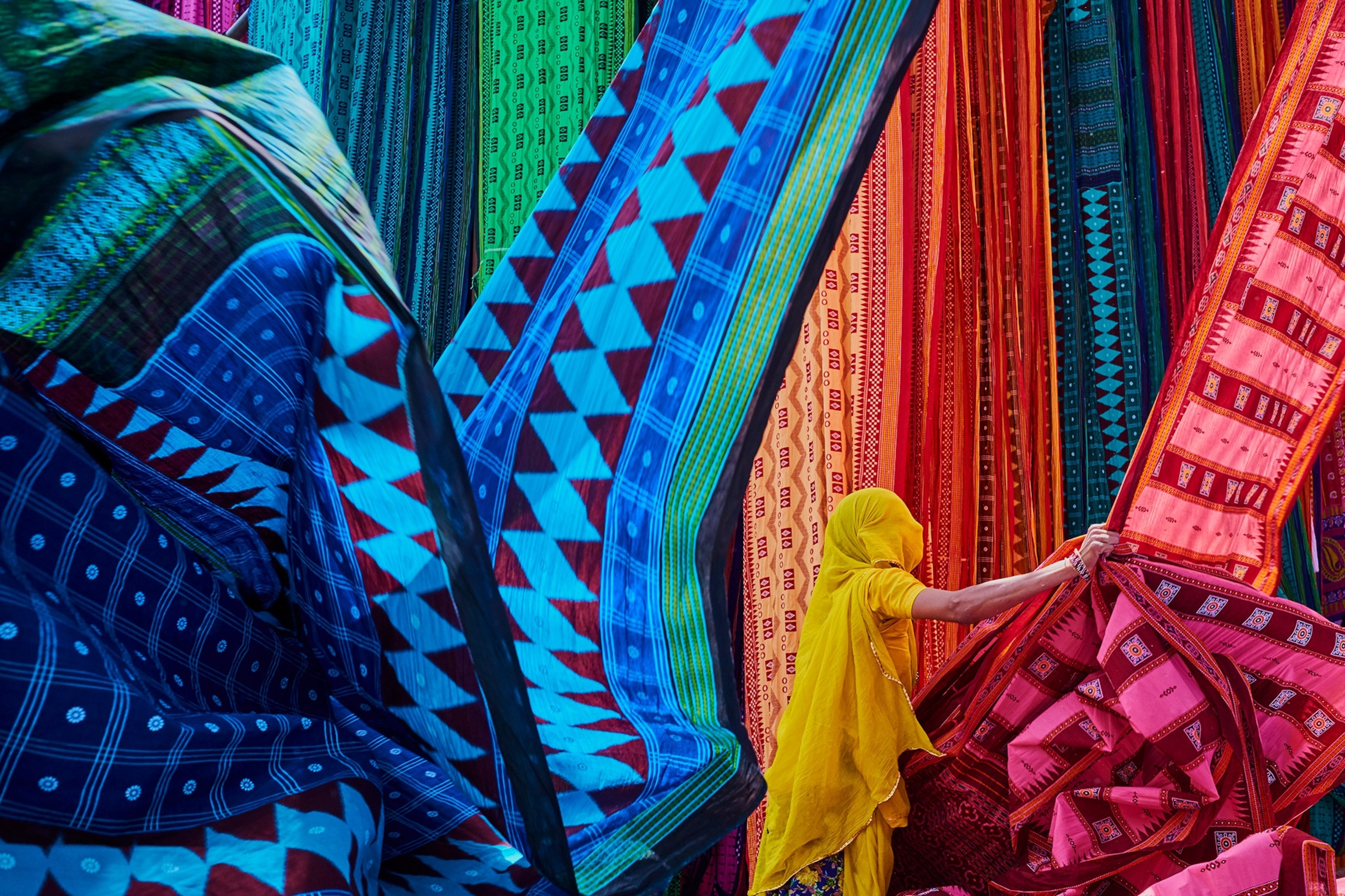 Women collecting textiles in India