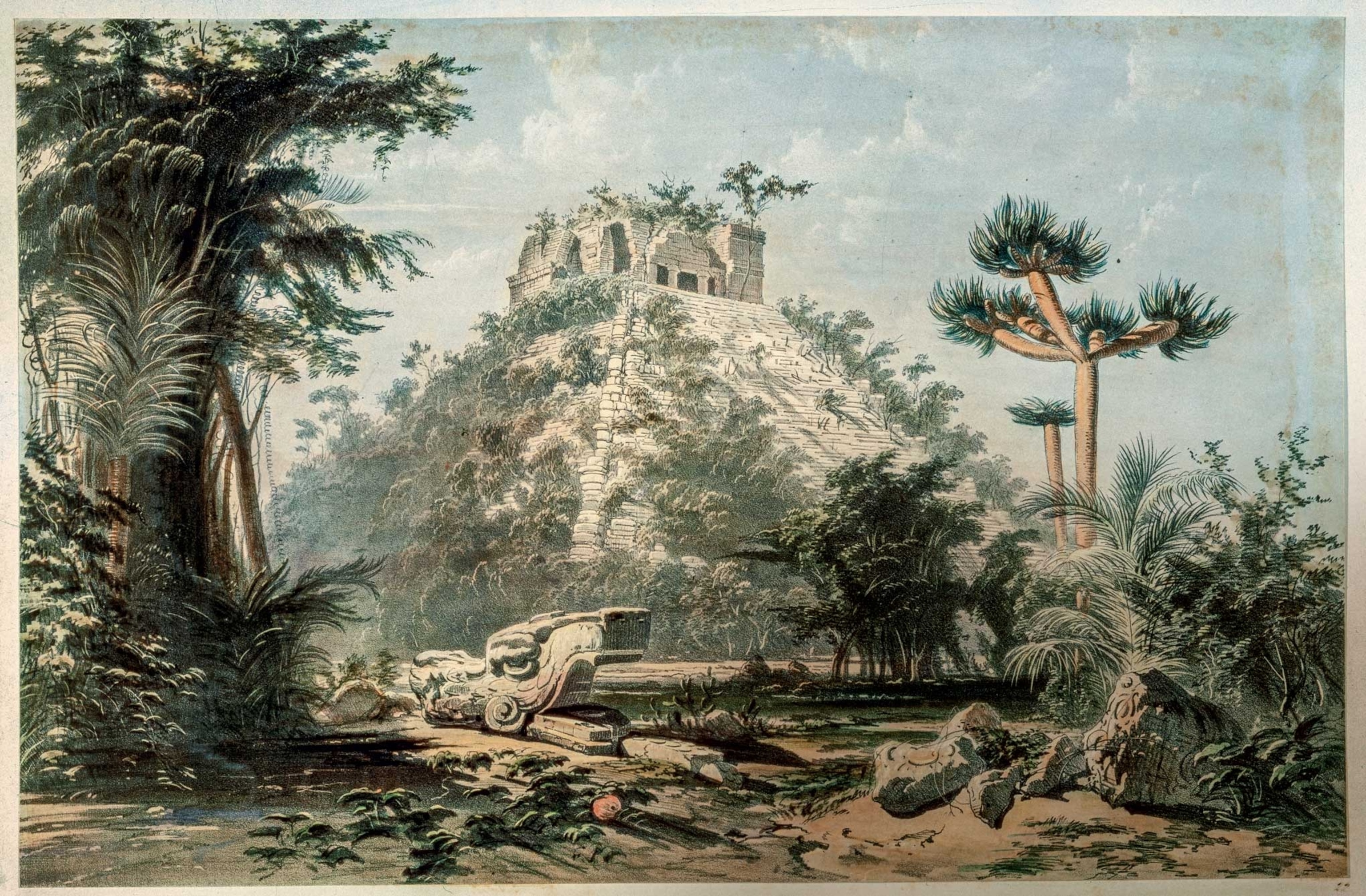 The Castillo, the step pyramid of Kukulkan at Chichén Itzá, with one of its two stone snake heads in the foreground.