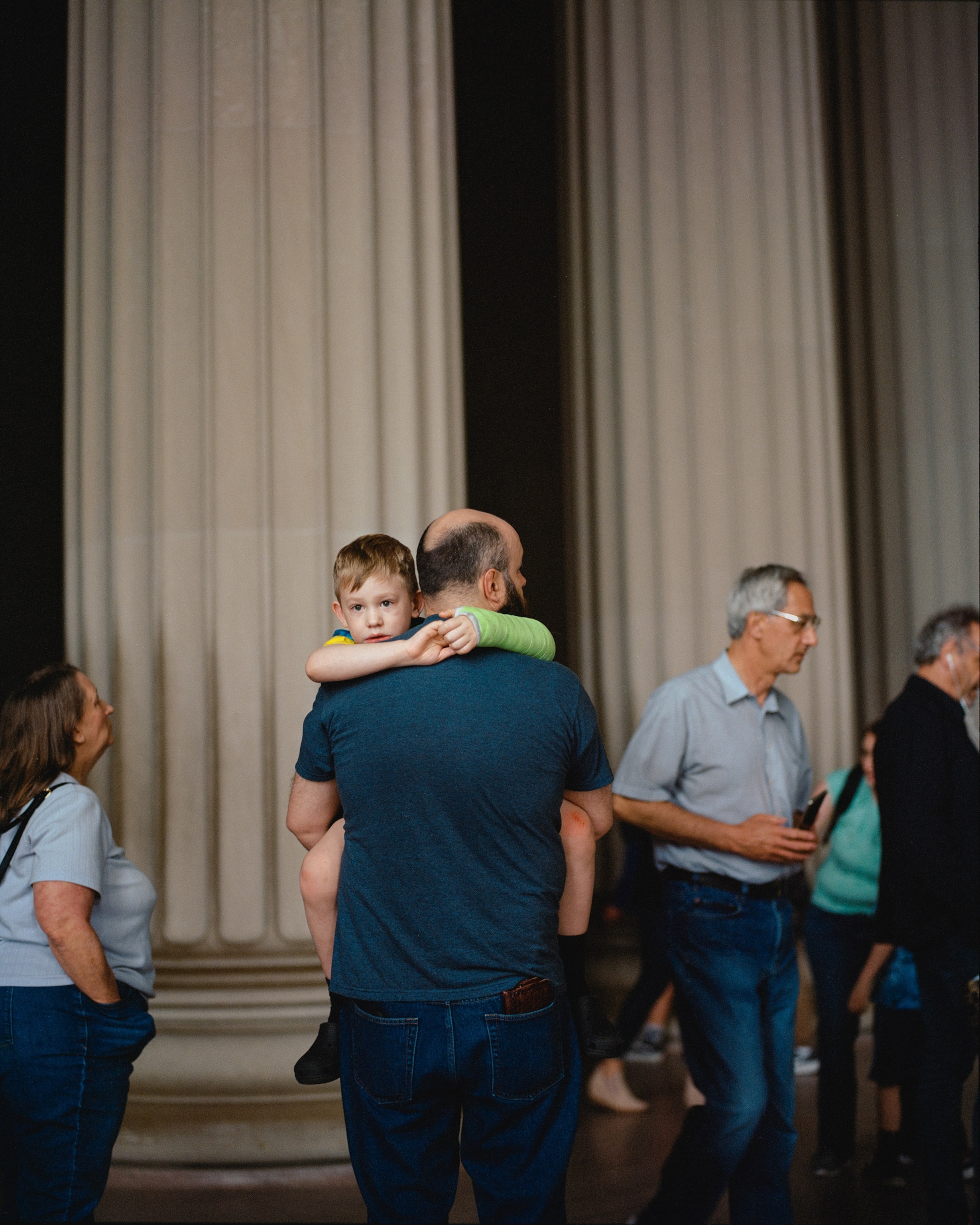 A child is held inside the chamber at the Lincoln Memorial