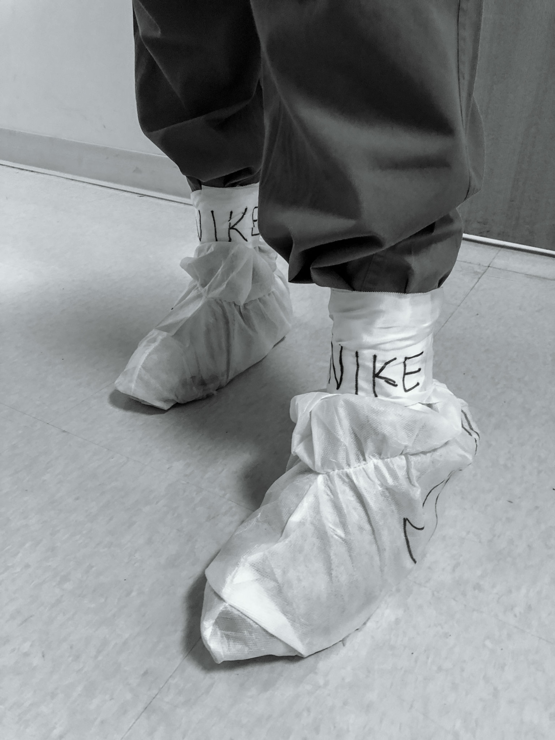 a nurse's scrubs made to look like Nike sneakers